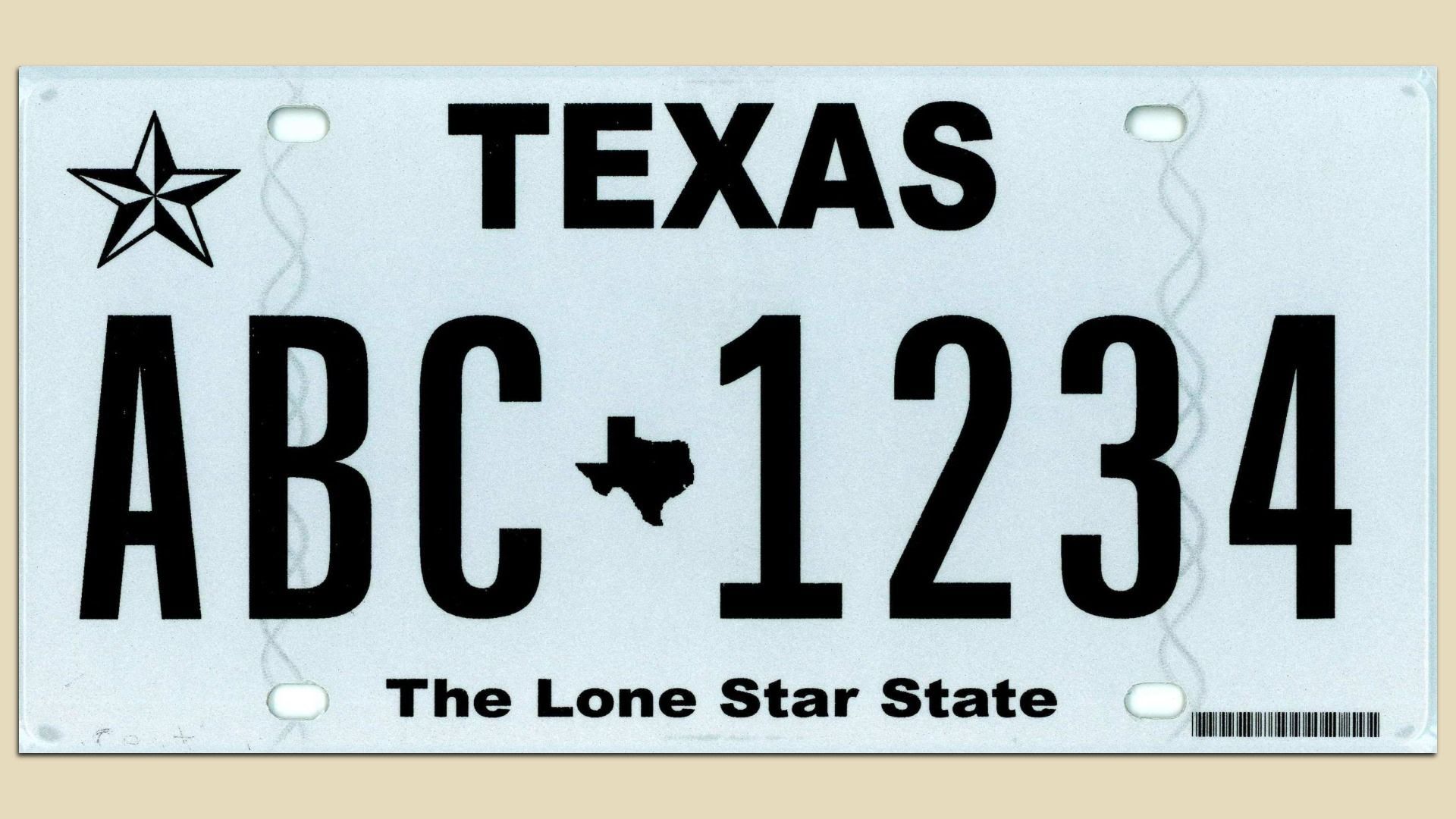 A white license plate that says "ABC1234" in black font