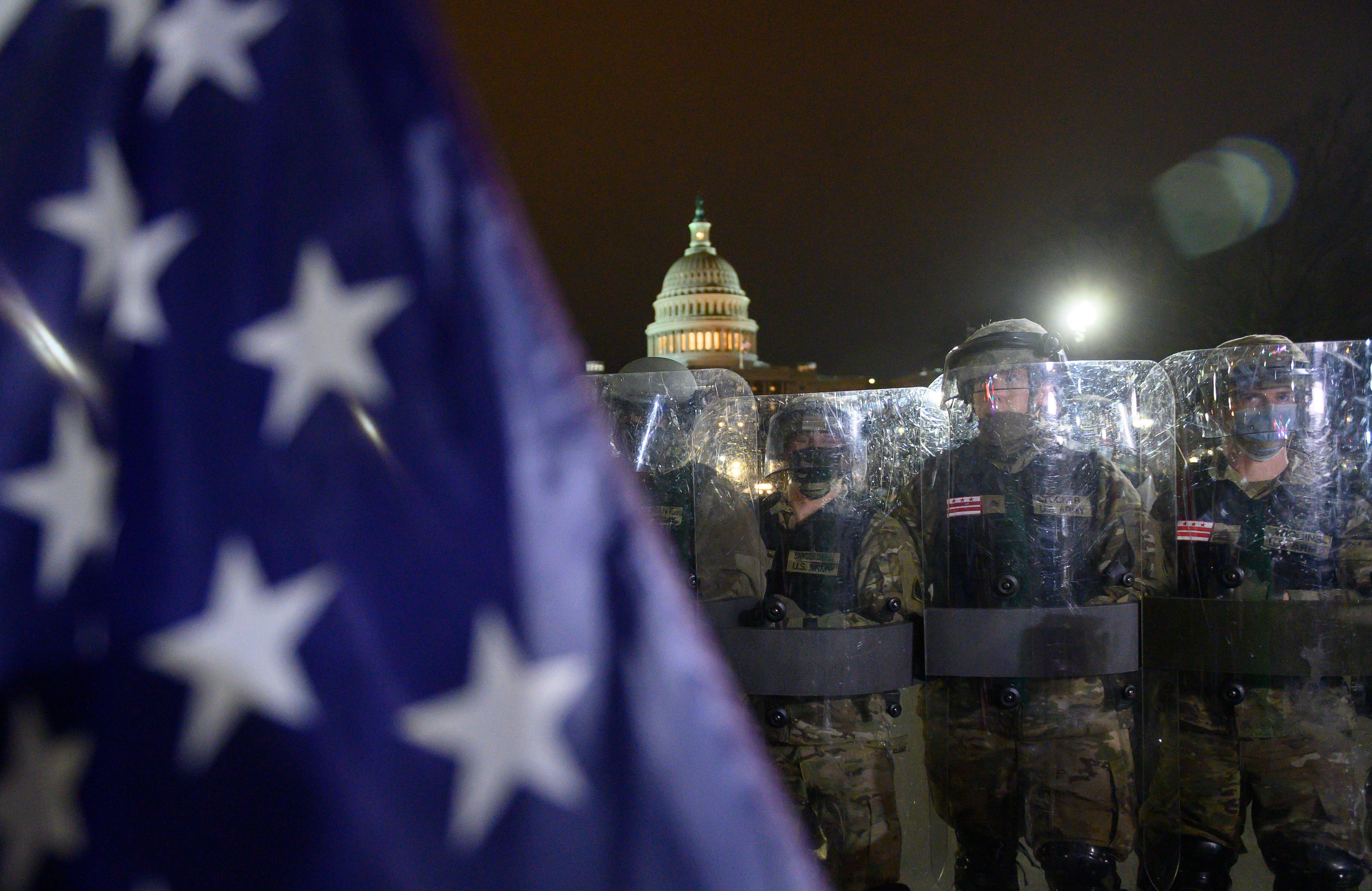 Members of the DC National Guard are deployed outside of the US Capitol in Washington DC on January 6