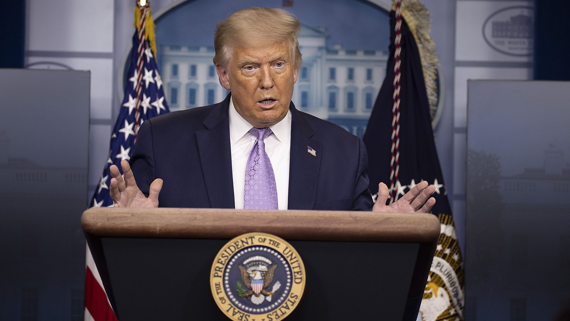 Trump behind the podium at the White House
