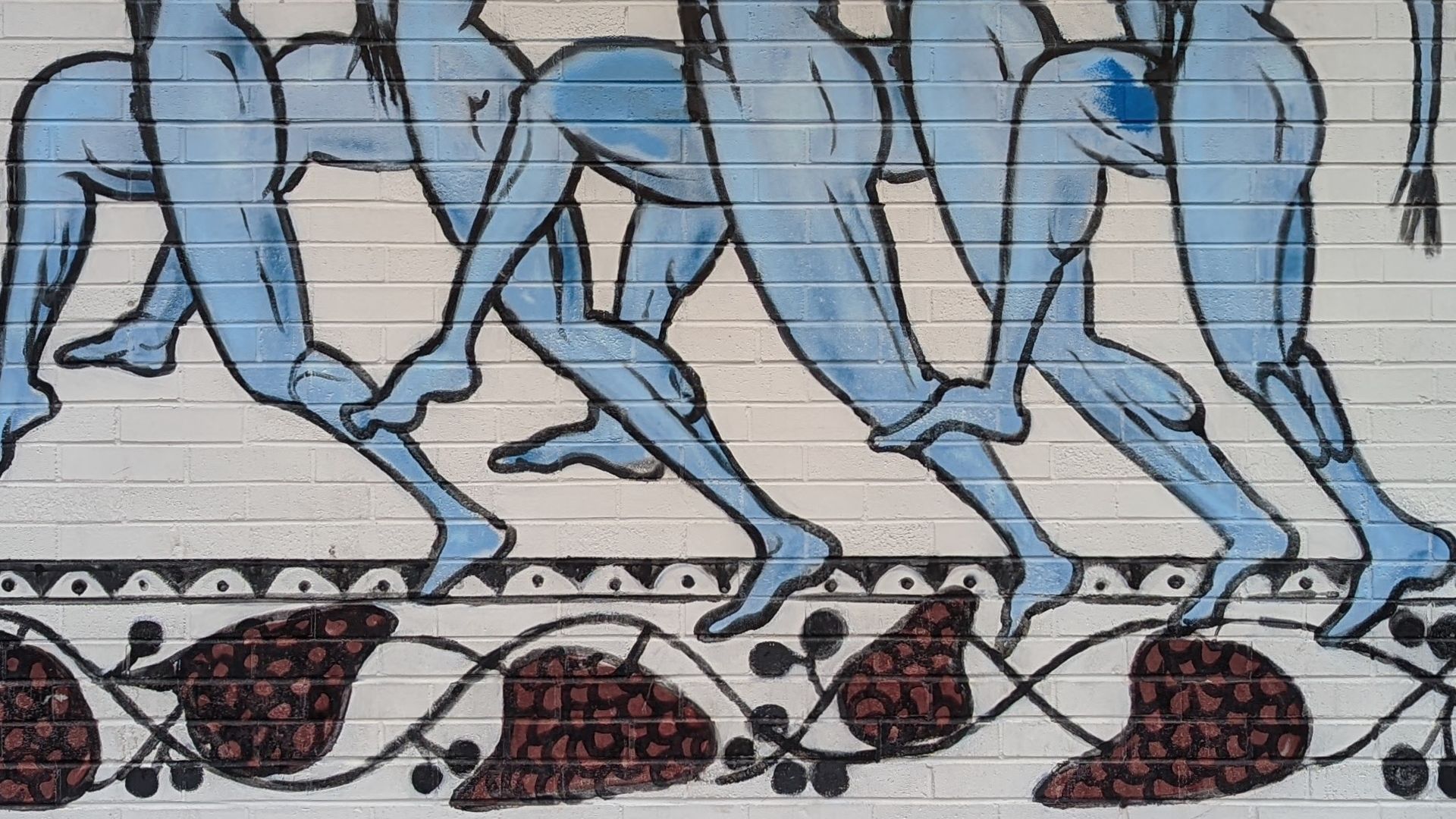 Blue, unclothed legs appear to be running.