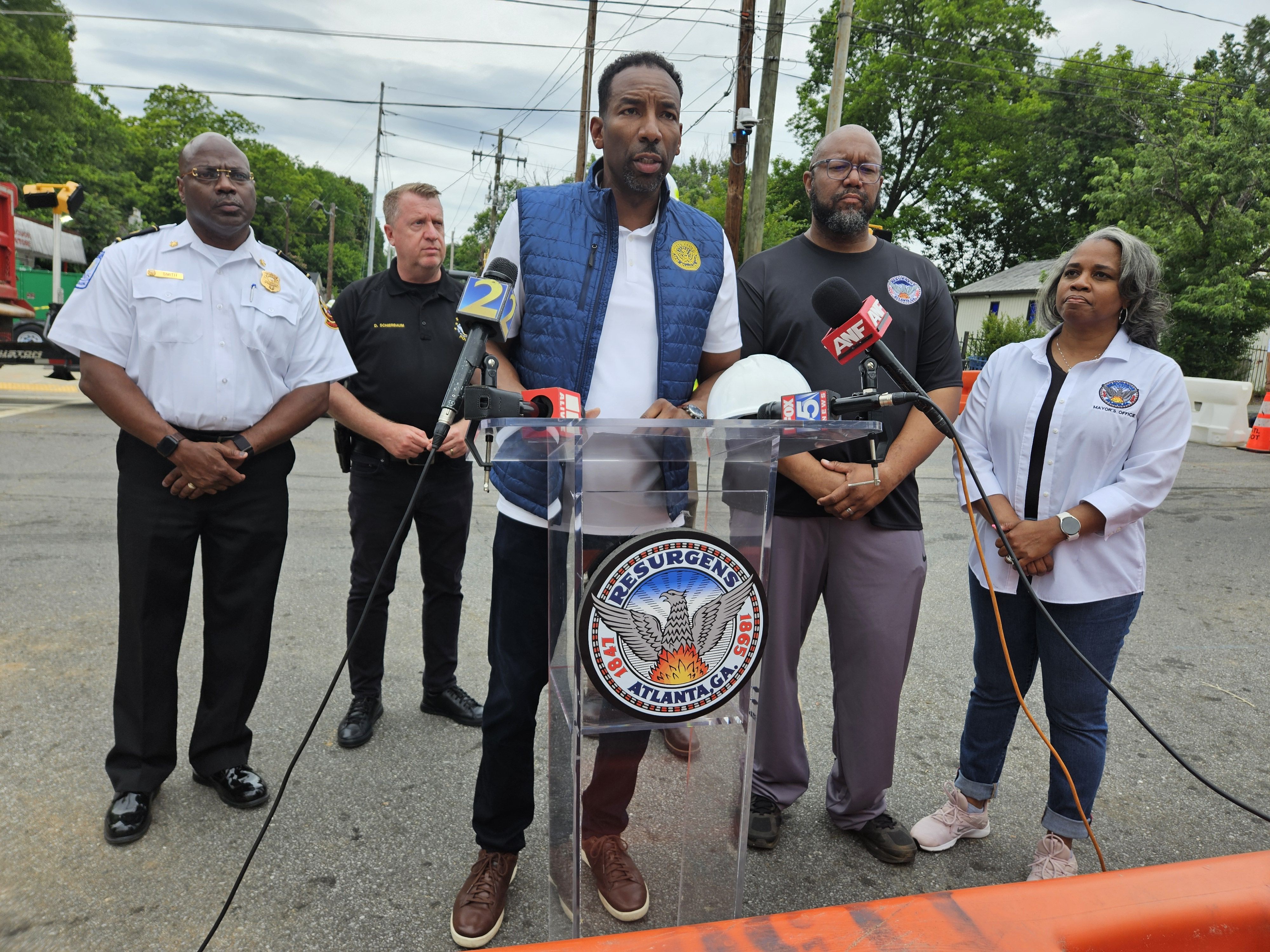 Mayor Andre Dickens speaks at a press conference