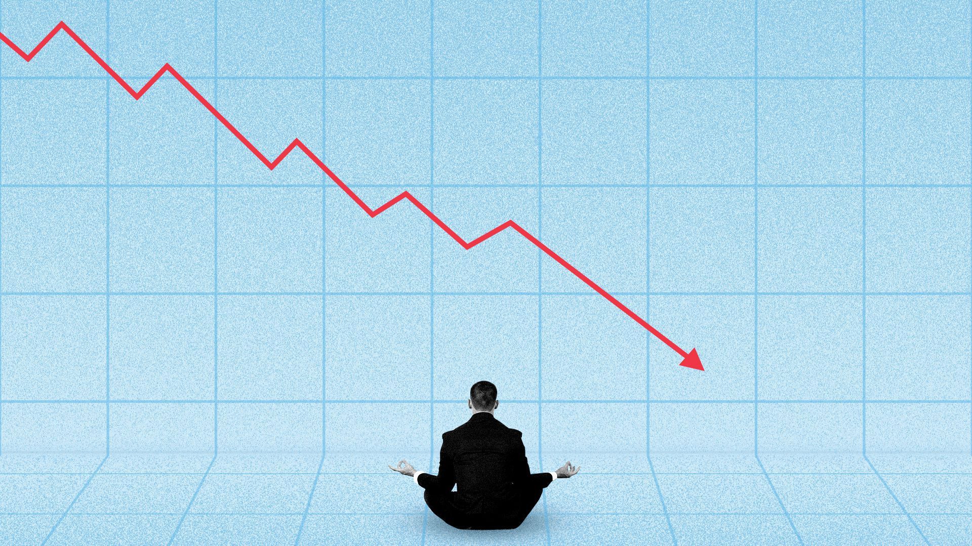 person sitting cross-legged facing a downward trending line graph