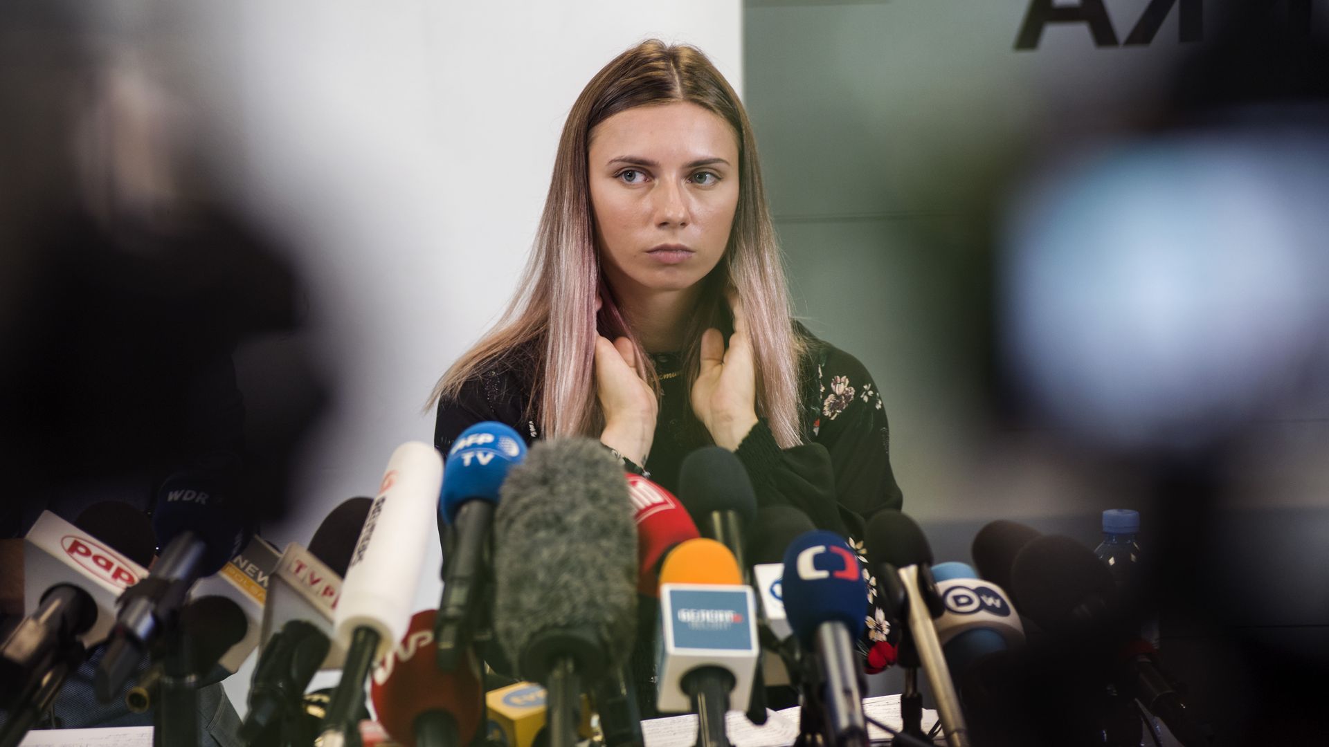 Krystsina during a press conference.