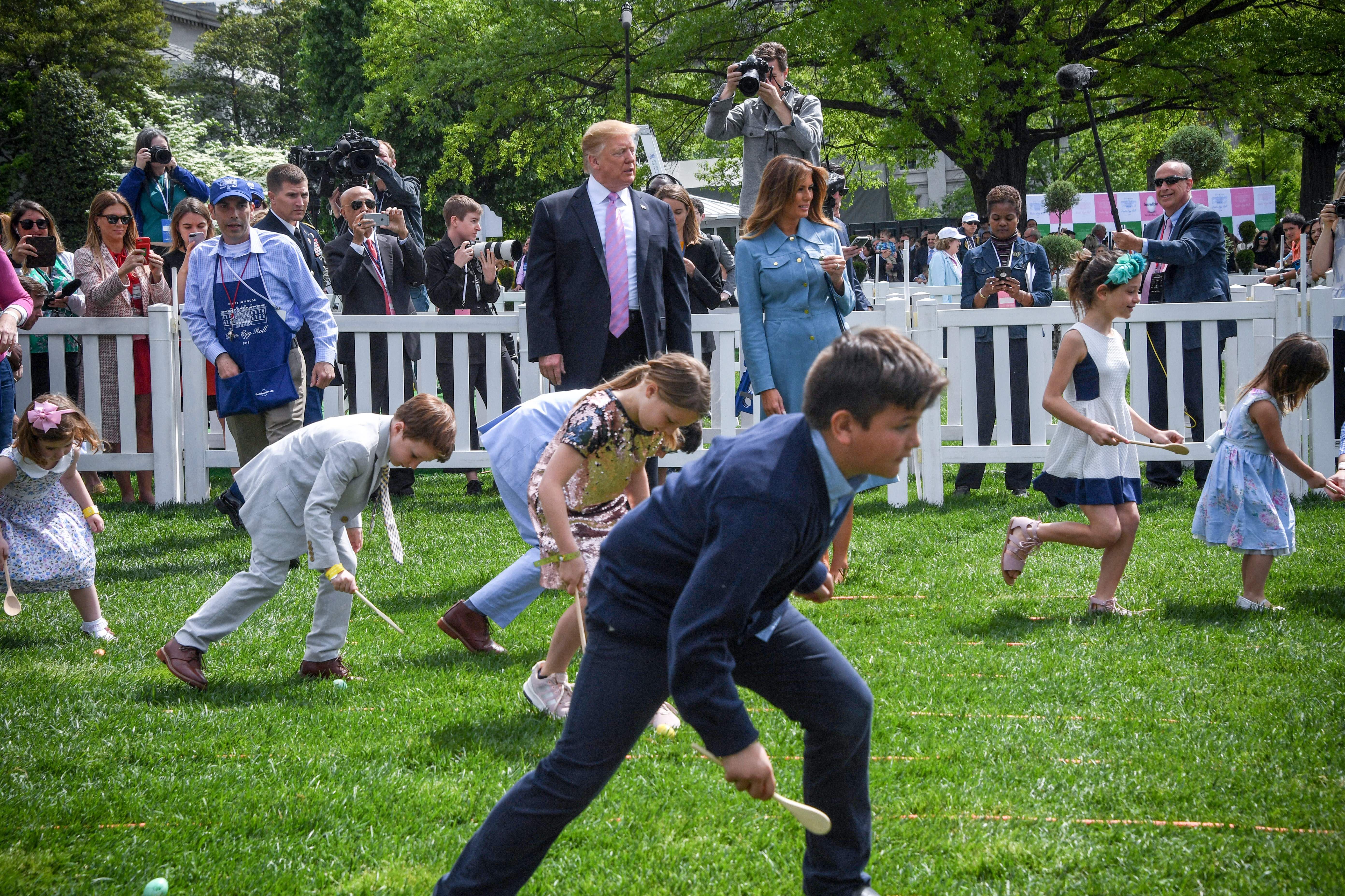 Trump nd Melania on the south lawn watching the easter egg roll