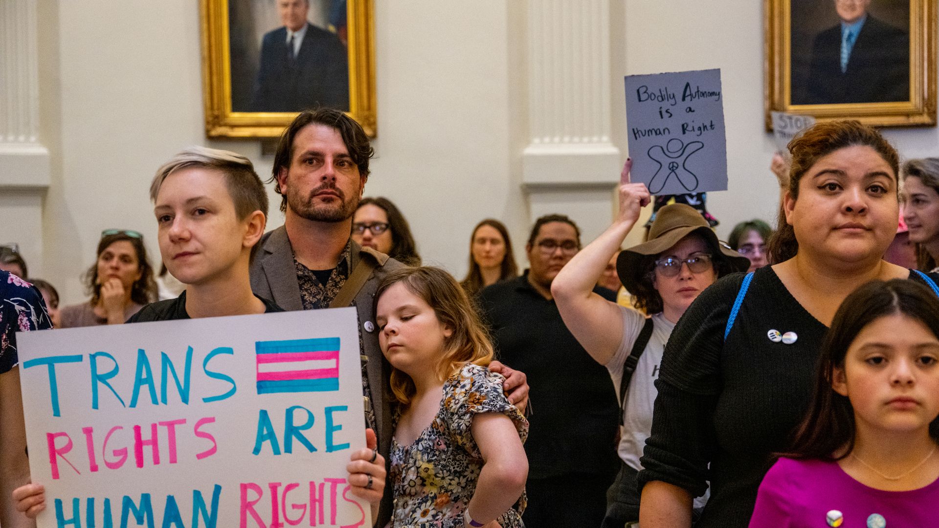 demonstrators and transgender rights activists gather during an International Women's Day abortion rights demonstration at the Texas State Capitol 