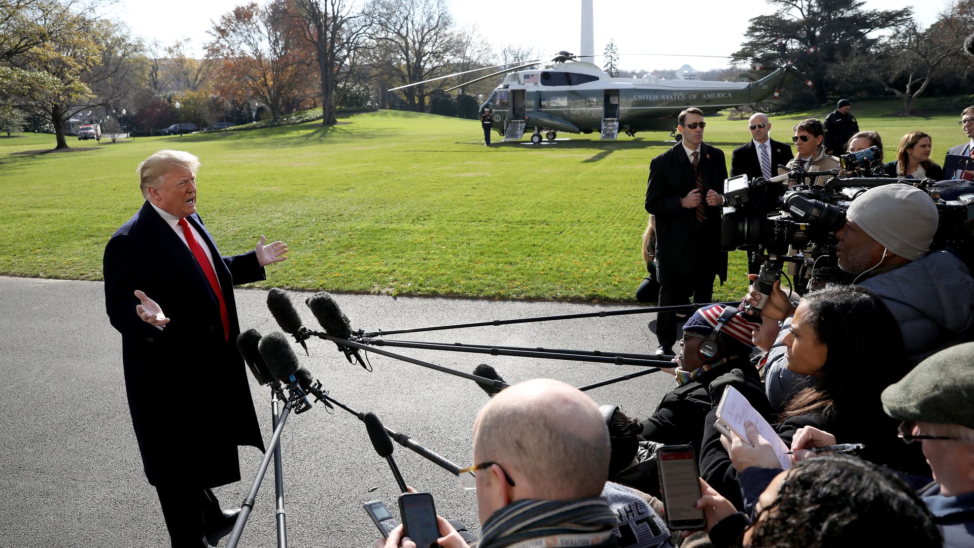 President Trump talks to reporters.