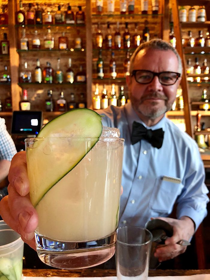 bartender-serving-cocktail-at-the-crunkleton