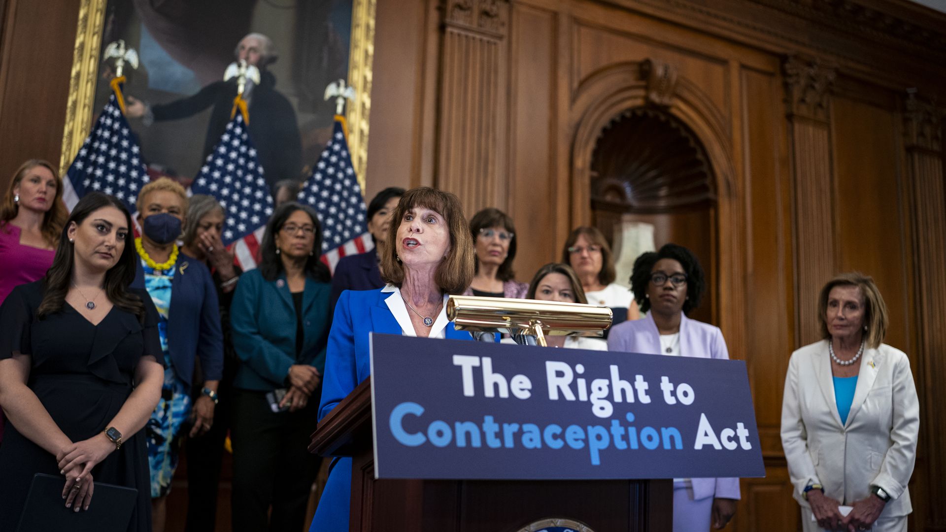 Picture of congresswomen standing behind a podium that says "the right to contraception act"