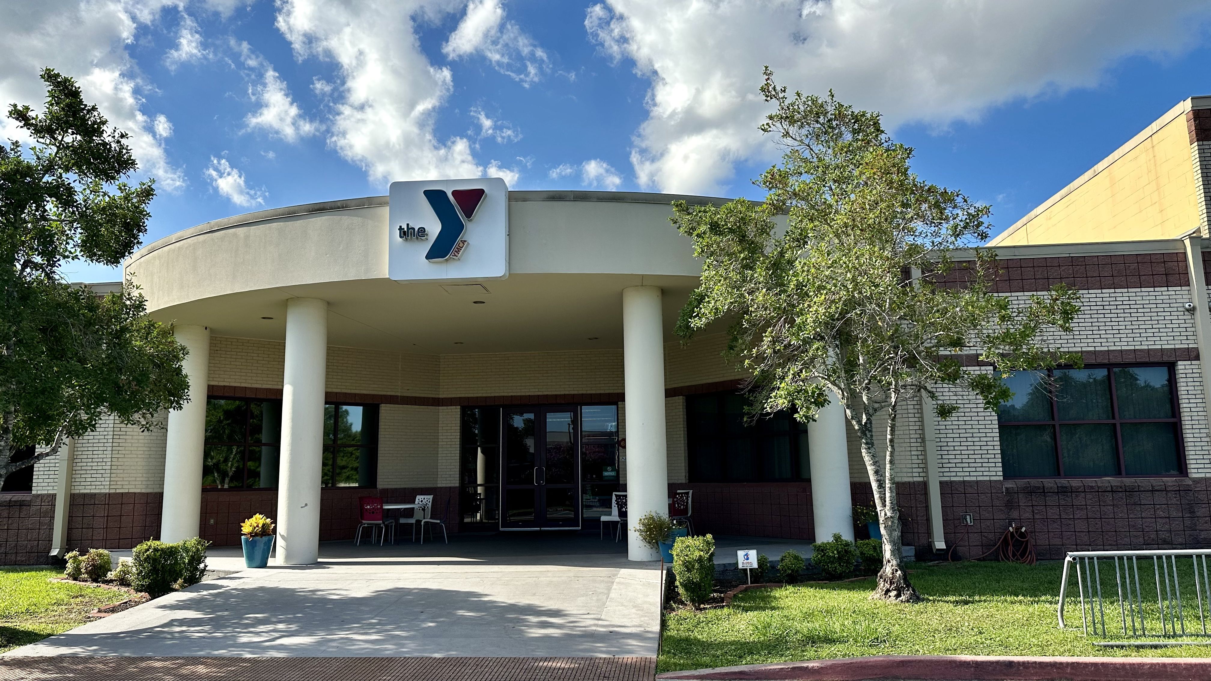 Image shows the exterior of the YMCA in Metairie