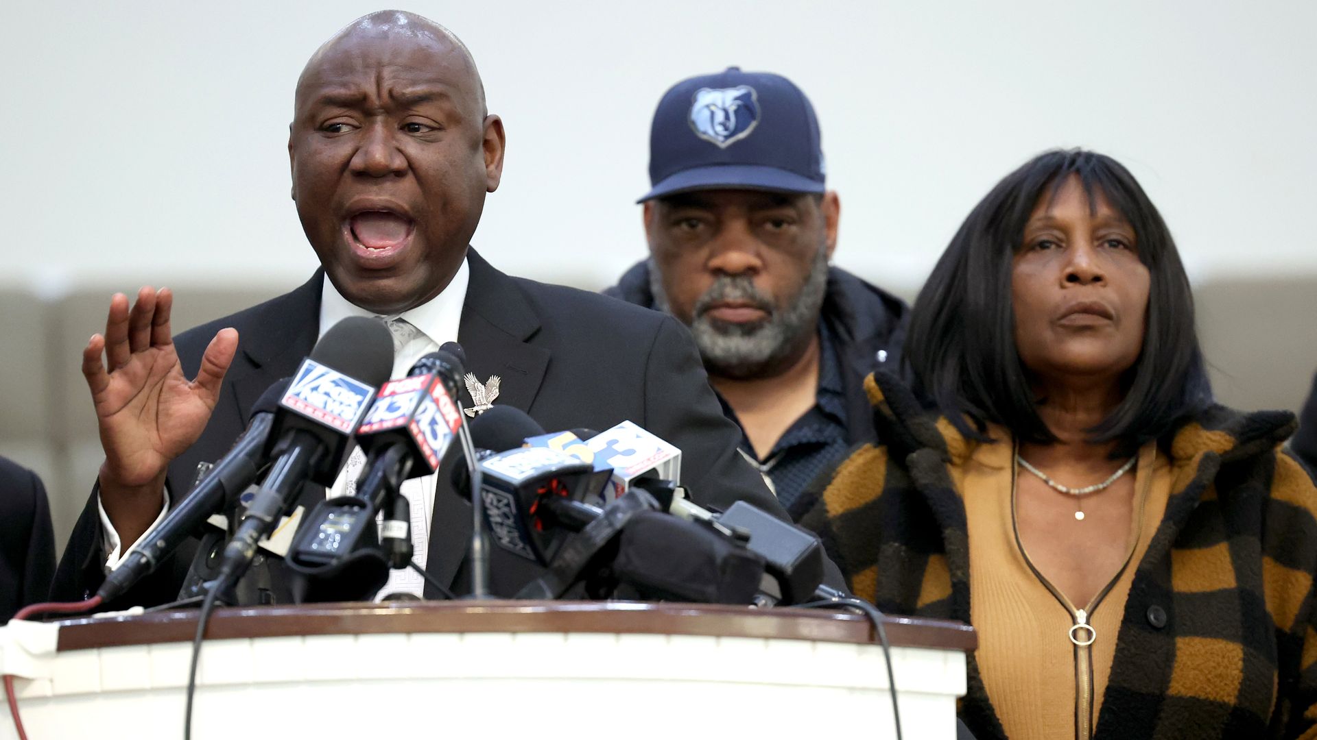 Rodney Wells (C) and RowVaughn Wells, the stepfather and mother of Tyre Nichols, and civil rights attorney Ben Crump in Memphis, Tennessee, in January 2023.