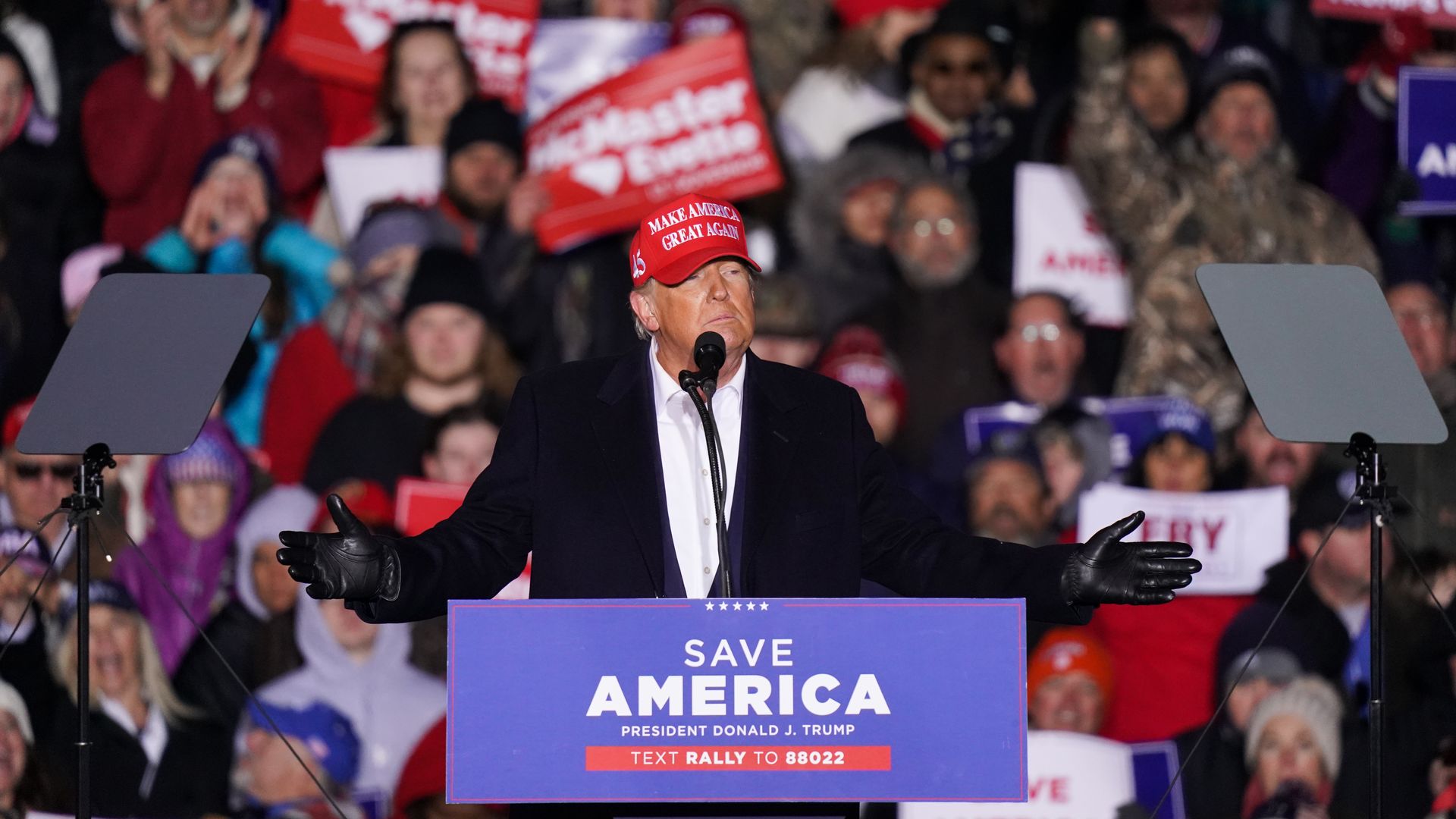 Donald Trump speaks to the crowd during a rally 