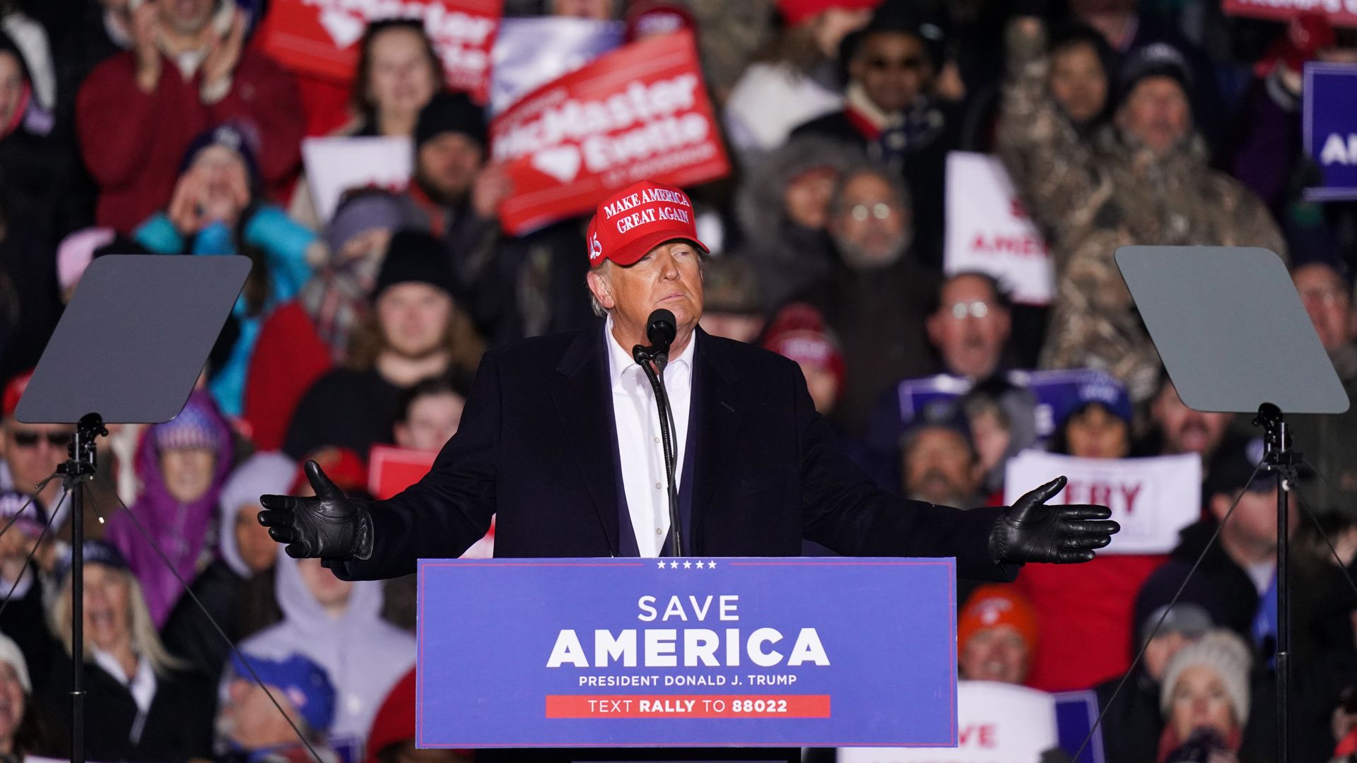 Donald Trump speaks to the crowd during a rally