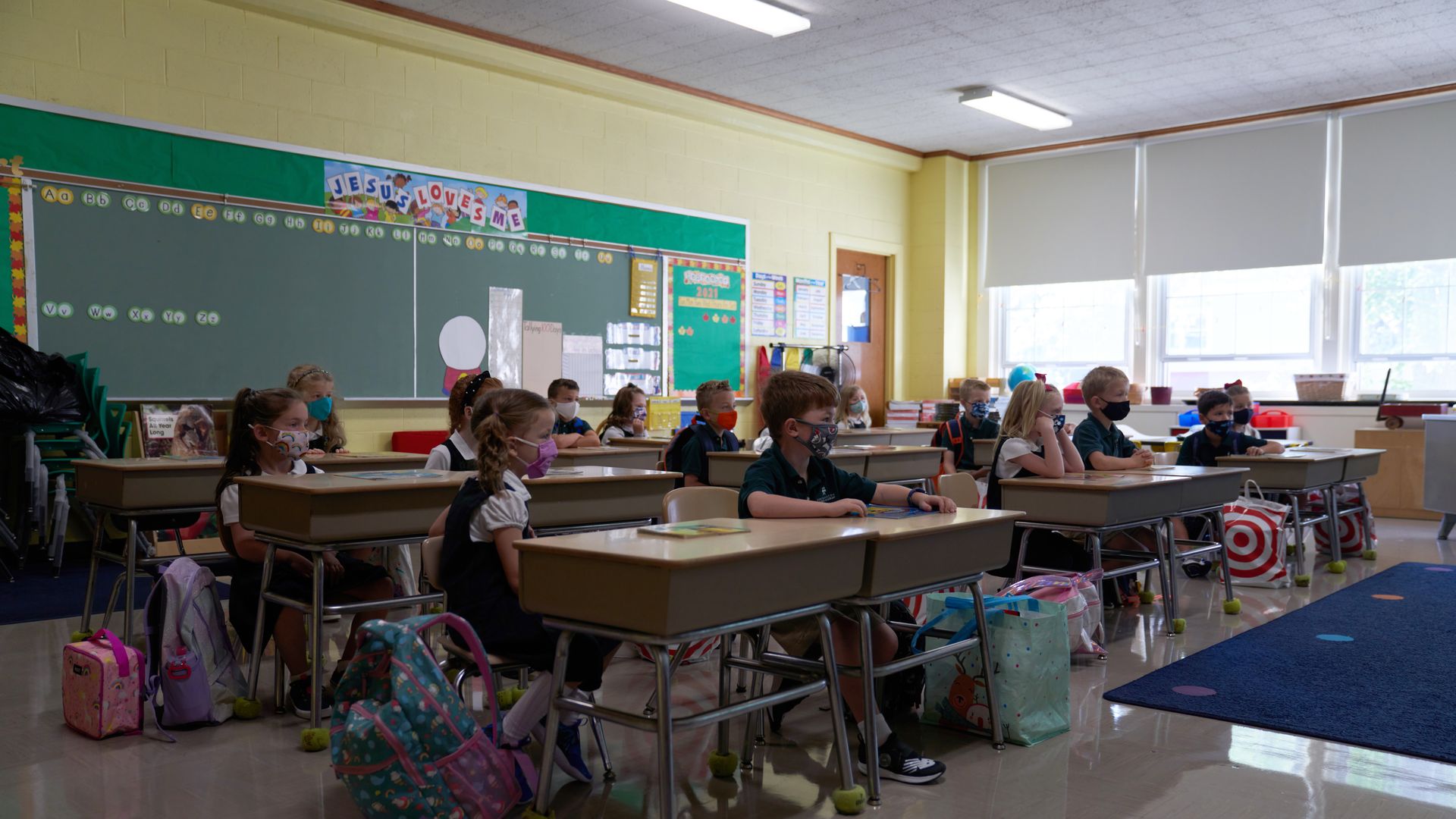 irst grade students at a Catholic elementary school on the first day of classes in Boston, Massachusetts, U.S., on Tuesday, Sept. 7, 2021.