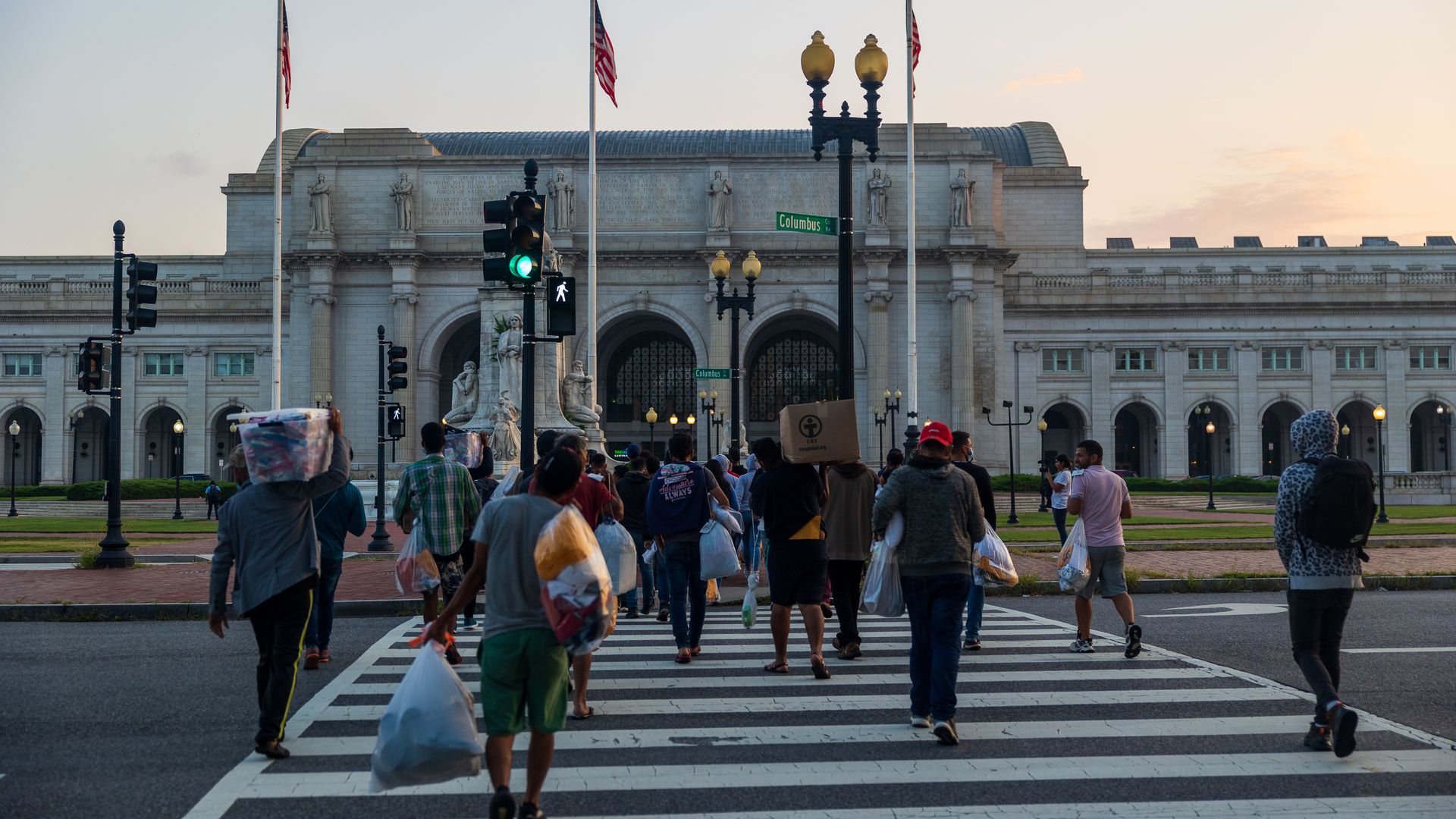 Migrants walking toward Union Station in D.C.