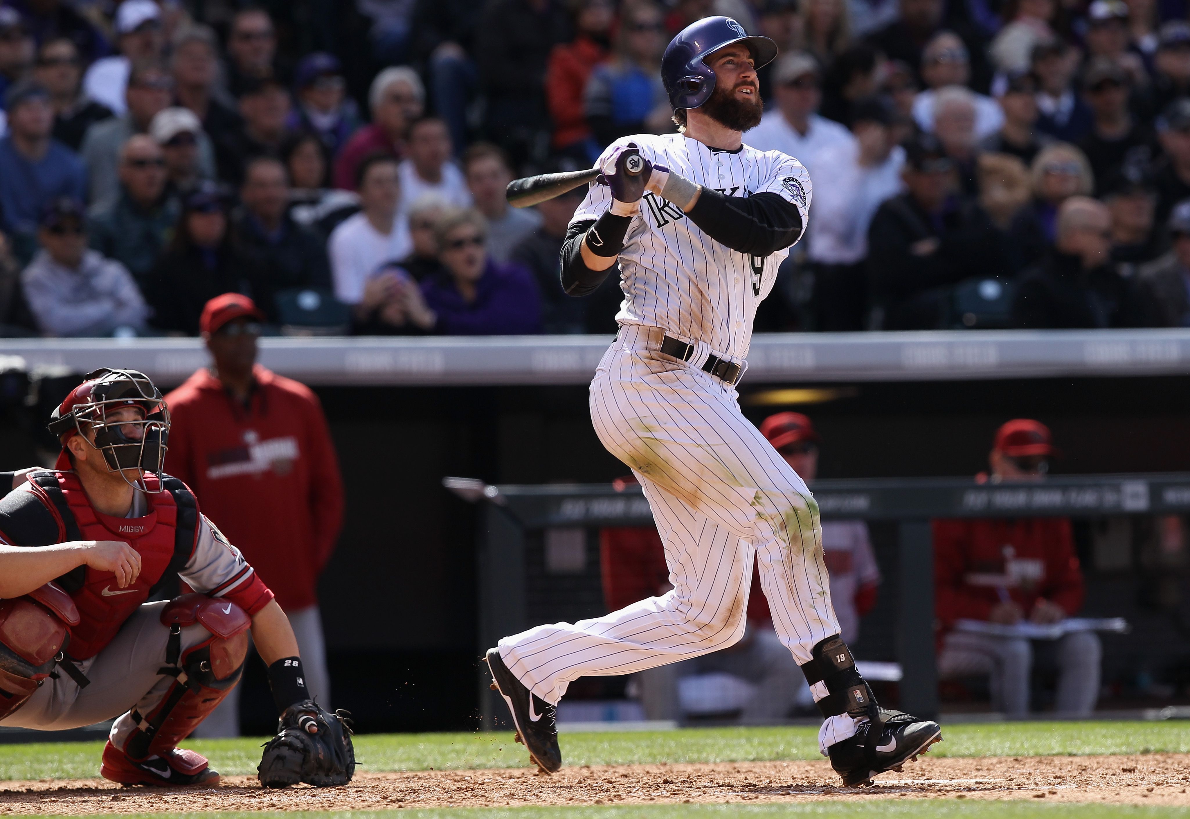 A short-bearded Charlie Blackmon batted 6-for-6 in his first opening day start in Denver with a homerun, three doubles and five RBIs as the Rockies routed the Diamondbacks 12-2. Photo: Doug Pensinger/Getty Images