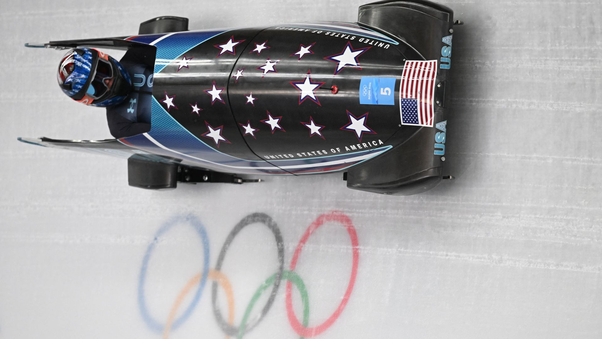 USA's Kaillie Humphries competes in the women's monobob bobsleigh event at the Yanqing National Sliding Centre during the Beijing 2022 Winter Olympic Games in Yanqing on February 14