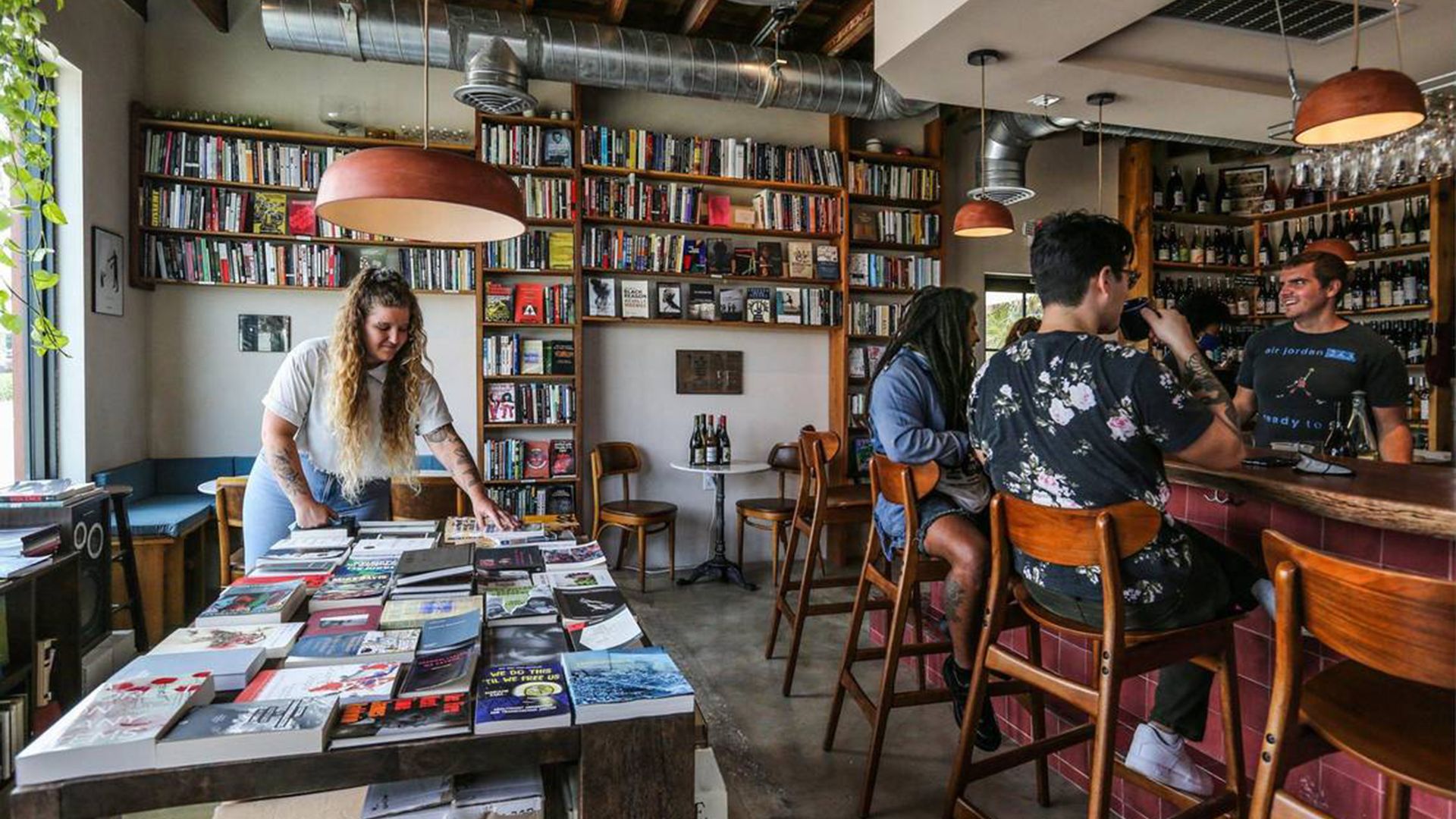 Owners of Paradis Books and Bread inside the cafe.