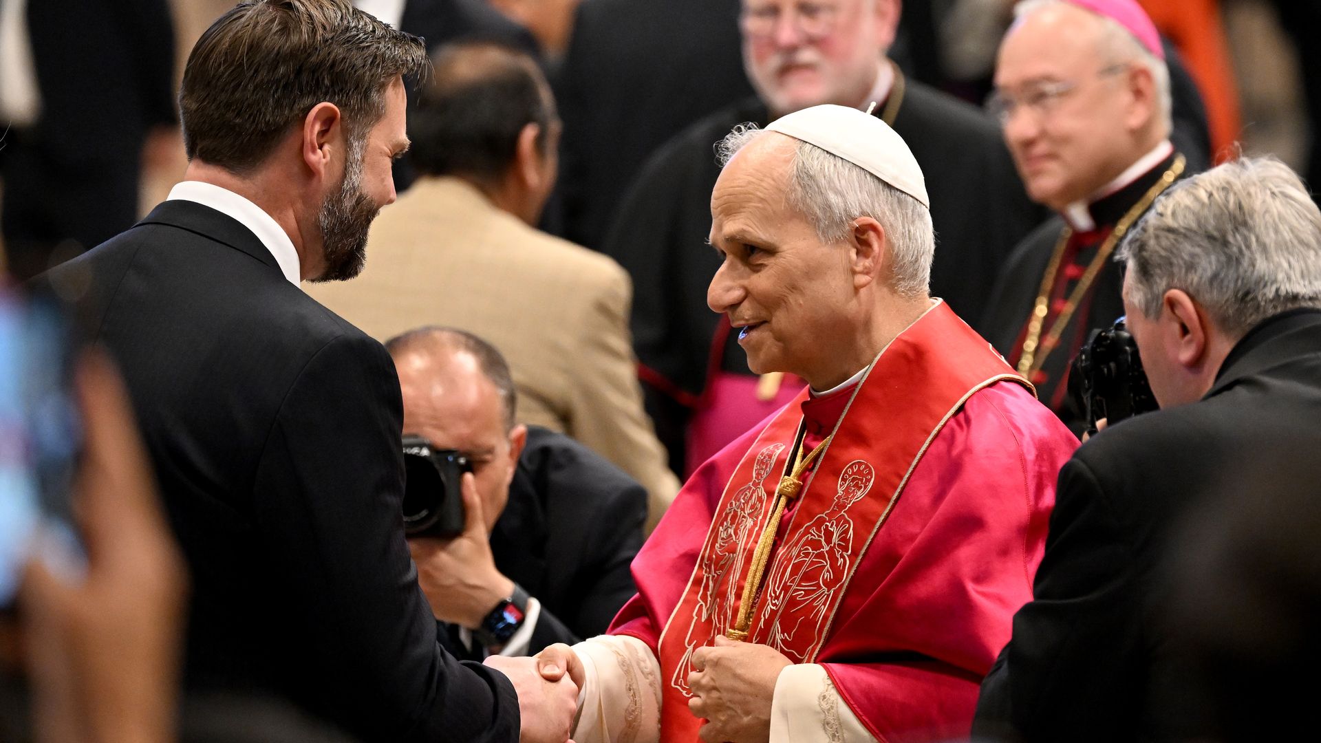 JD Vance and Pope Leo shake hands 
