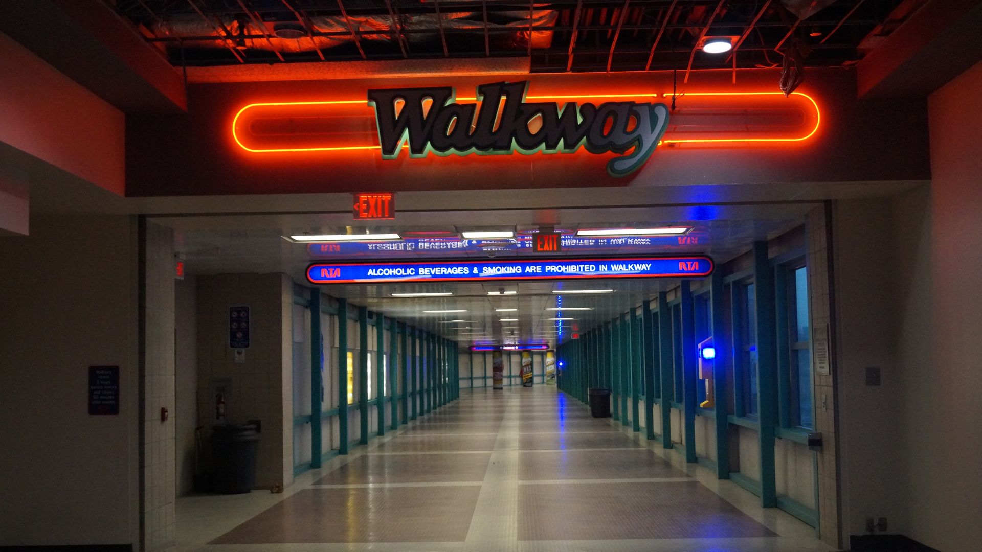 A walkway with "Walkway" neon signage 