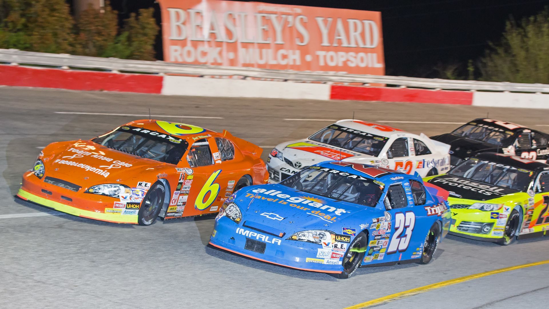 Cars race around the Nashville fairgrounds speedway in 2015. 