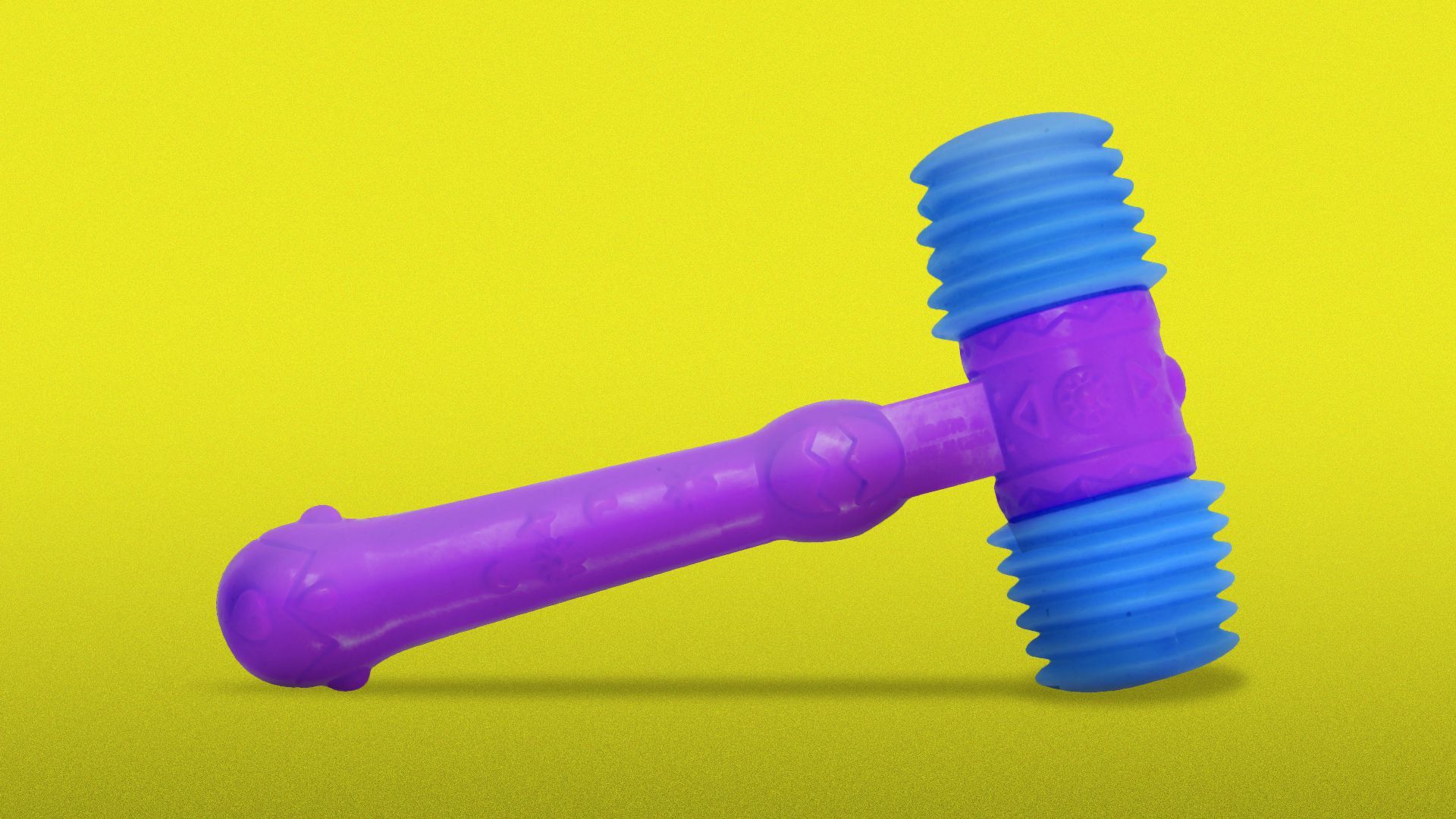 Illustration of a colorful toy gavel.