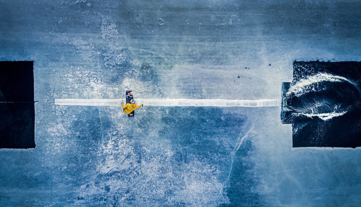 wakeboarding on a rail from overhead view