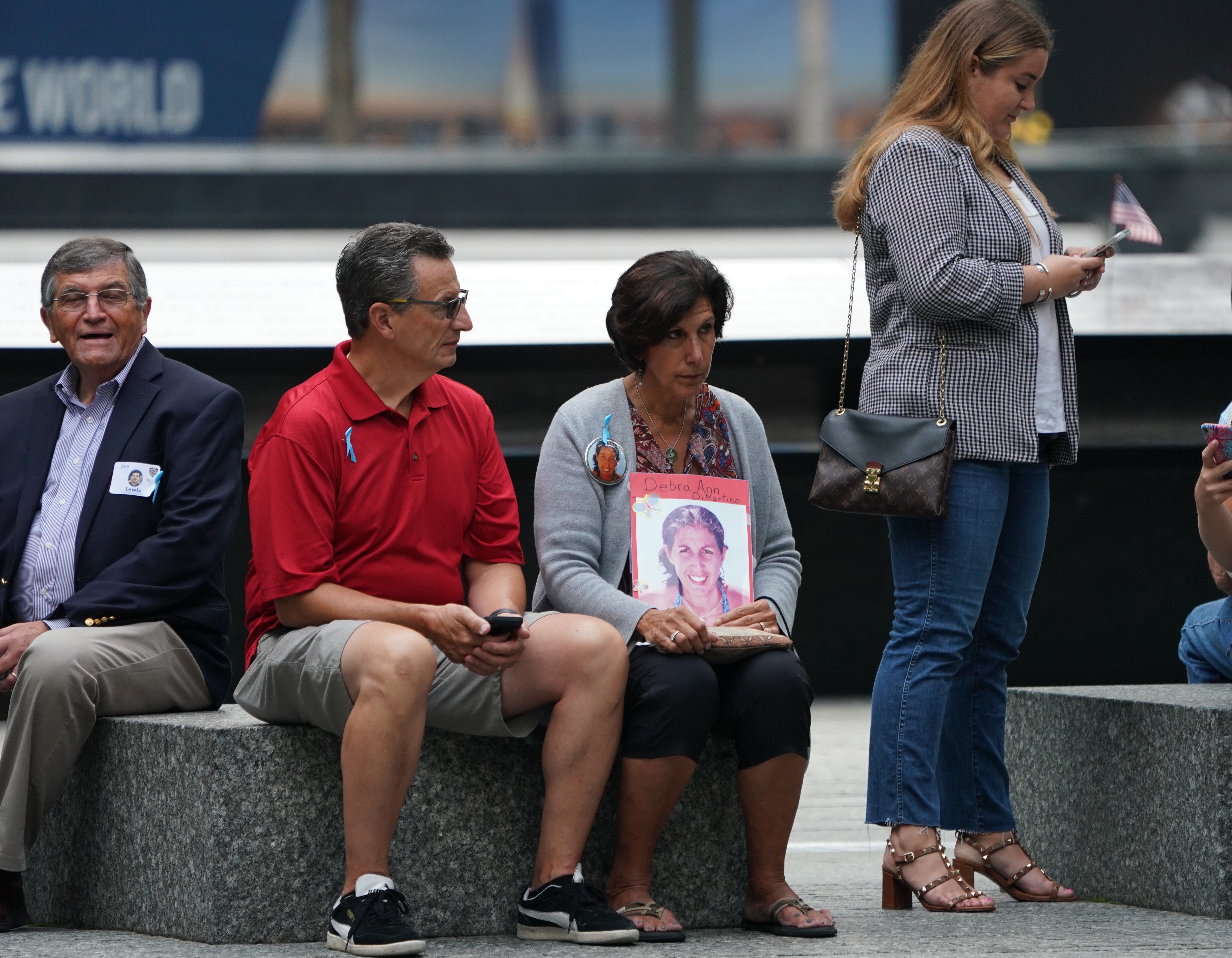 Relatives of victims attend the September 11 Commemoration Ceremony at the 9/11 Memorial at the World Trade Center