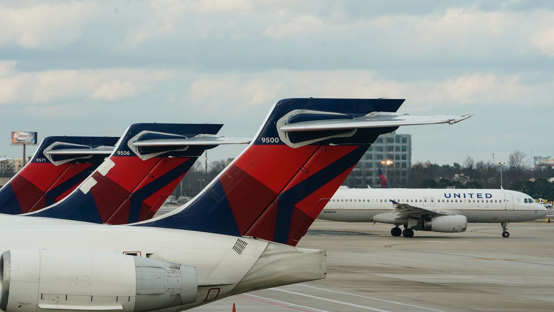 Photo of United Airlines planes parked at an airport