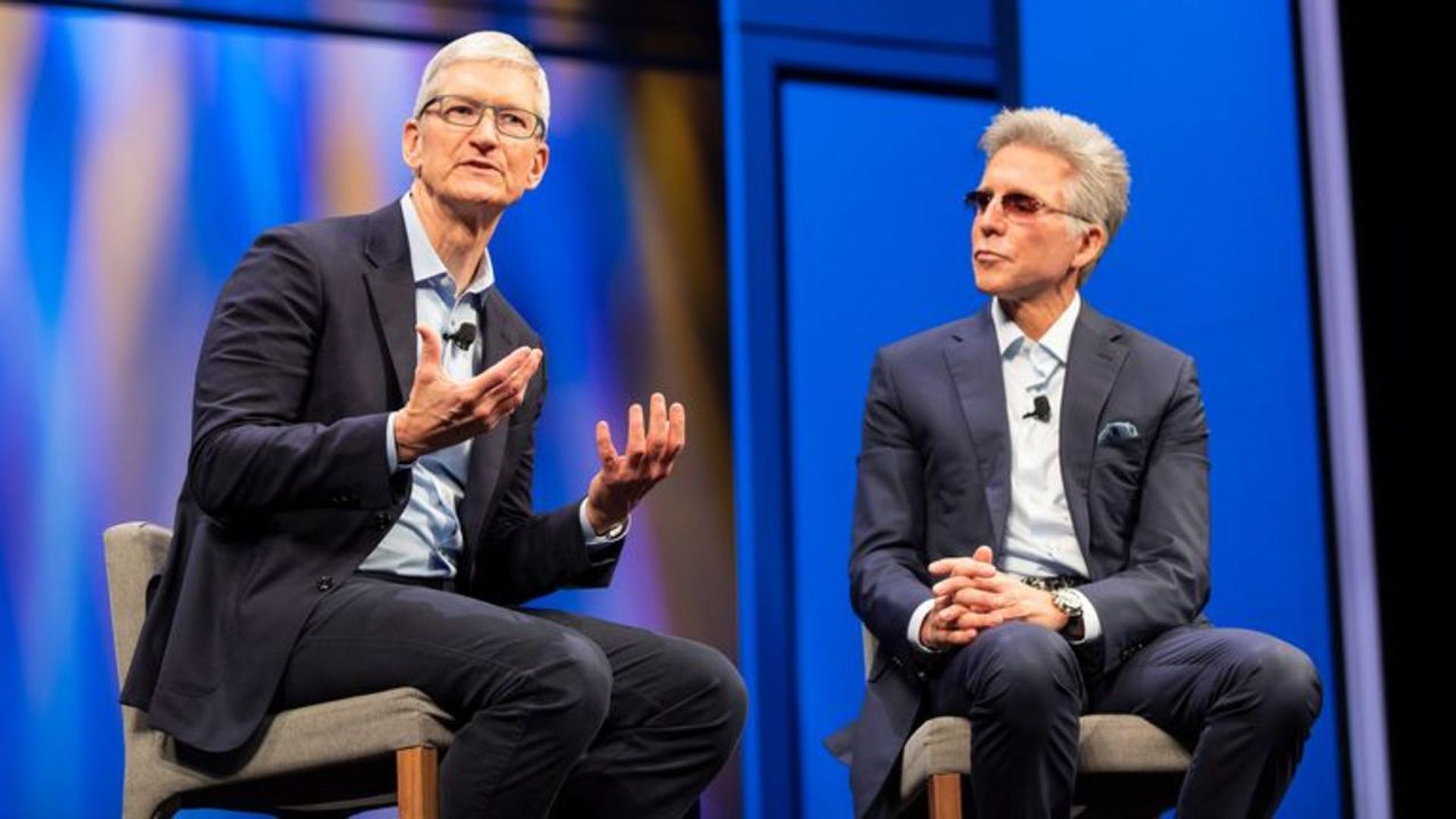 Tim Cook joined SAP CEO Bill McDermott (r) at its Sapphire conference to announce an expanded partnership. Photo: Apple
