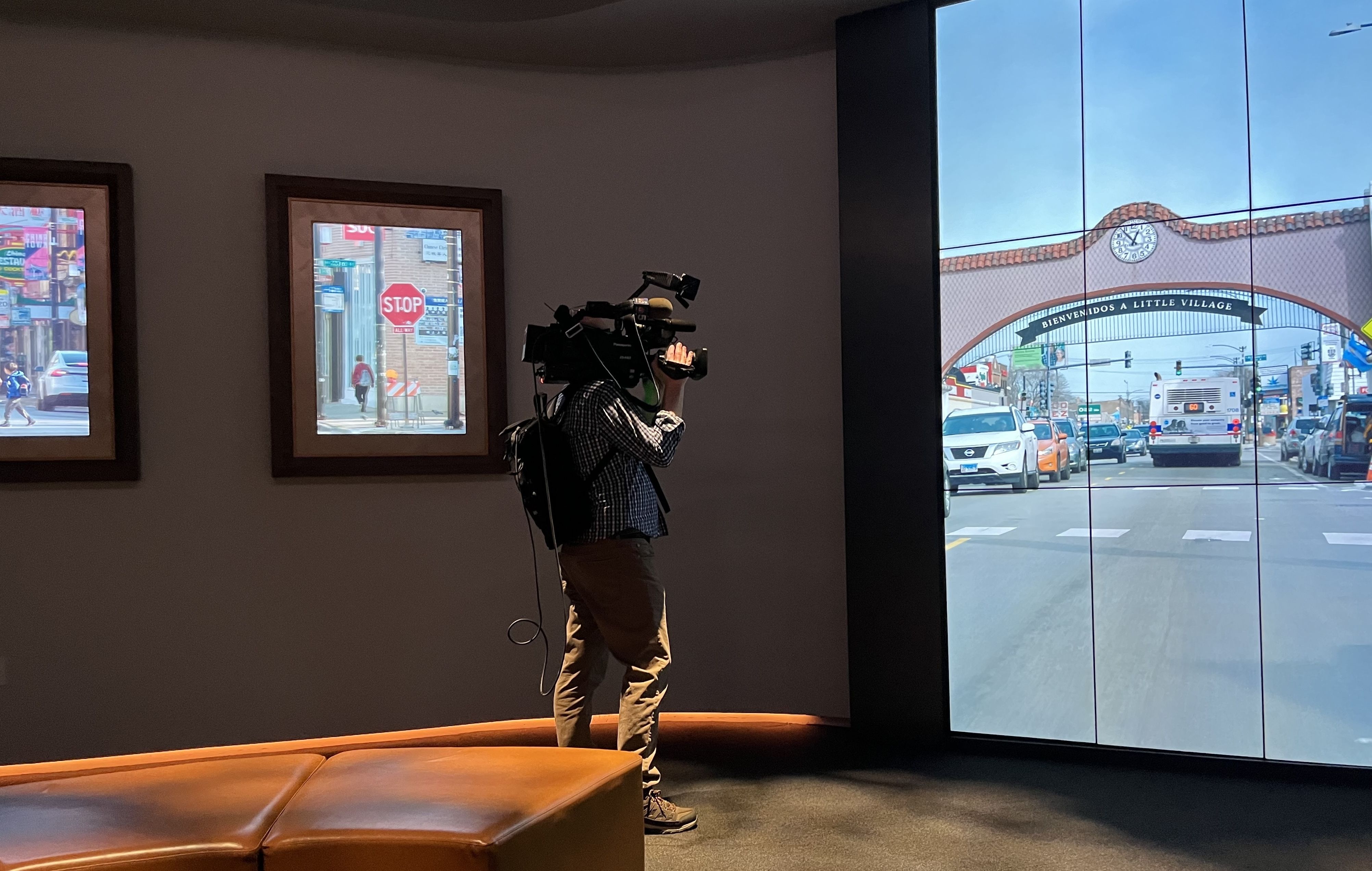 Photo of a man with a camera taking pictures 