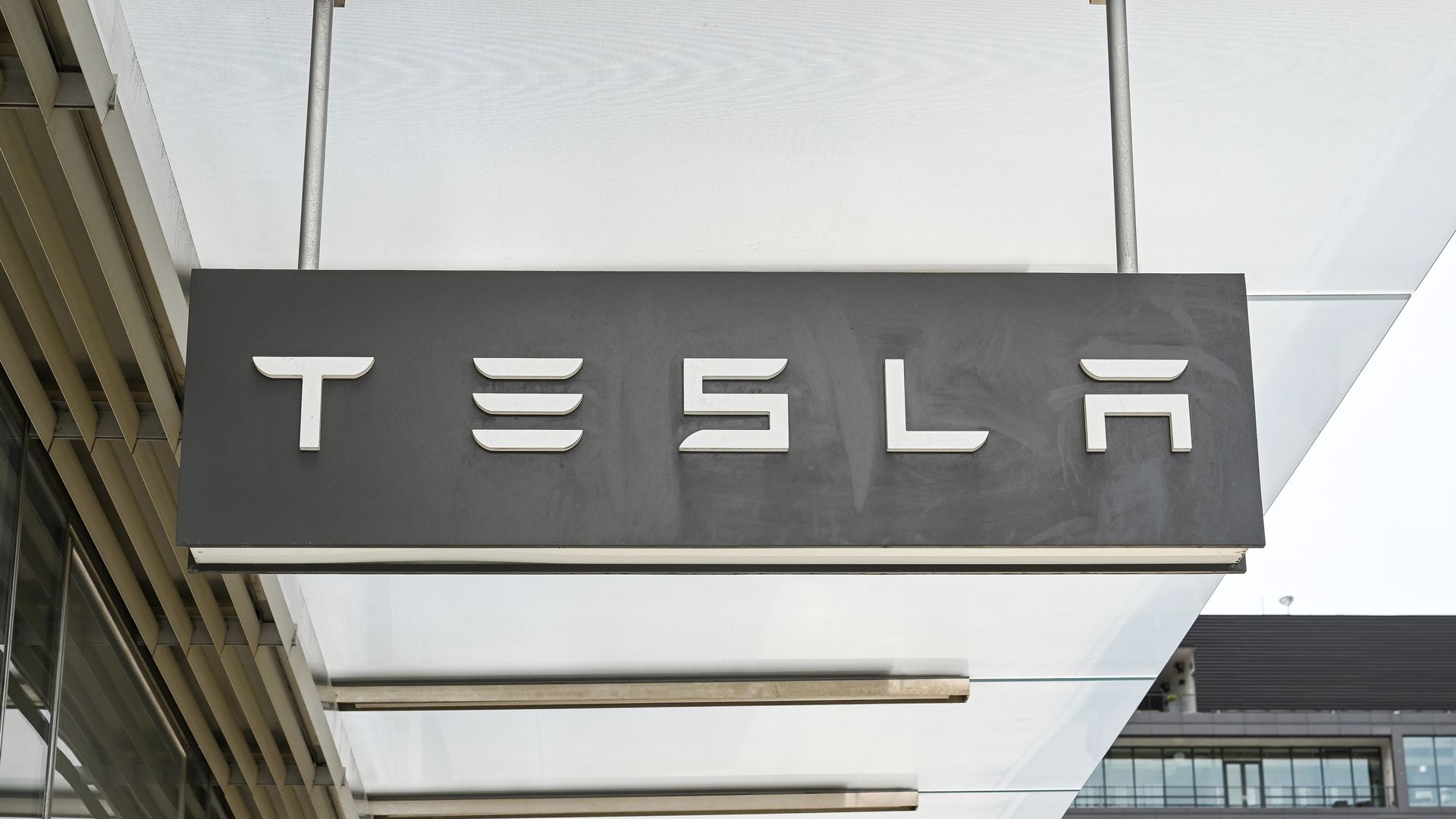 Photo of a Tesla sign.