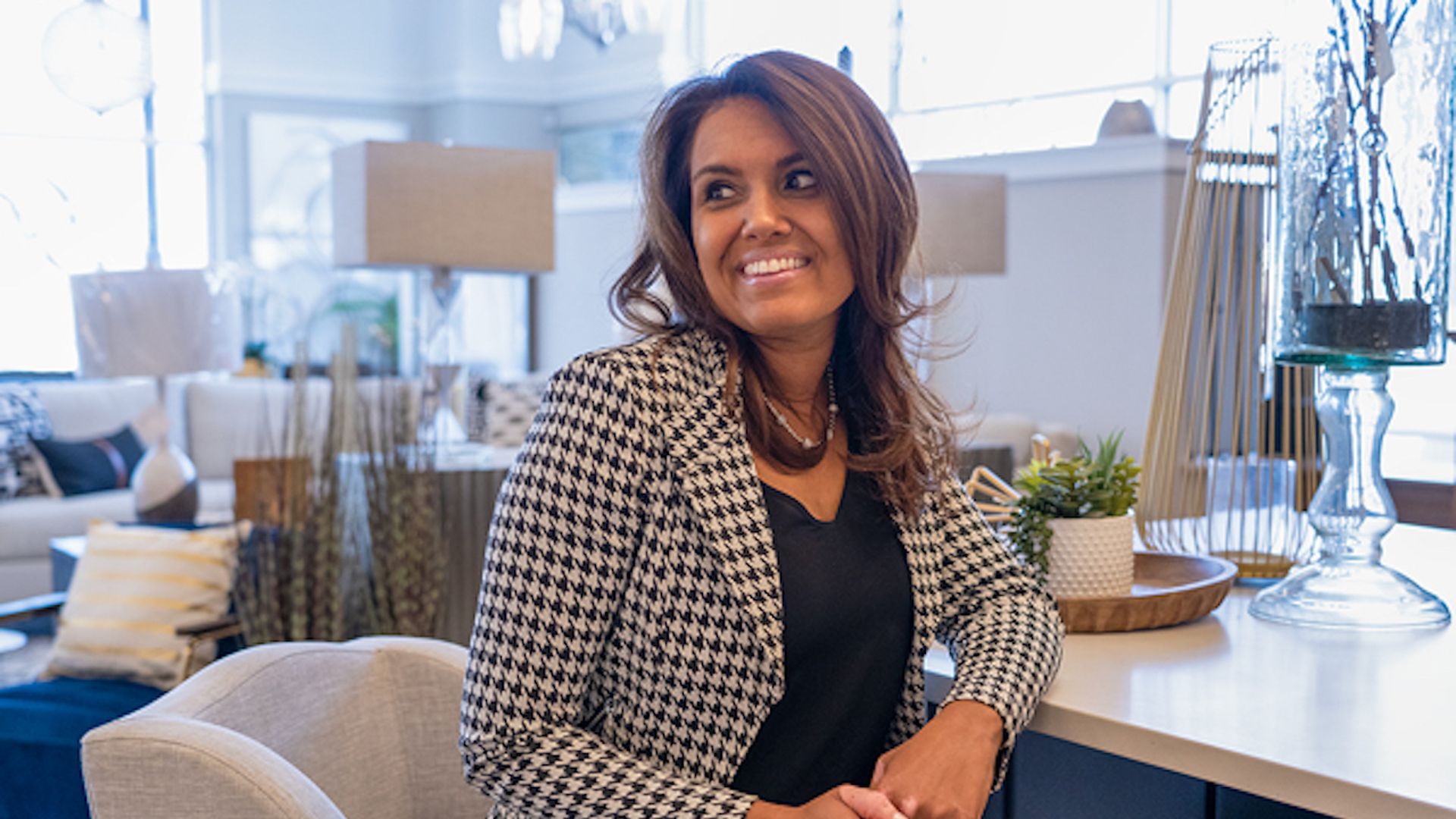 Poonam Moore looks out over the showroom of her business PoonamÕs by Design.