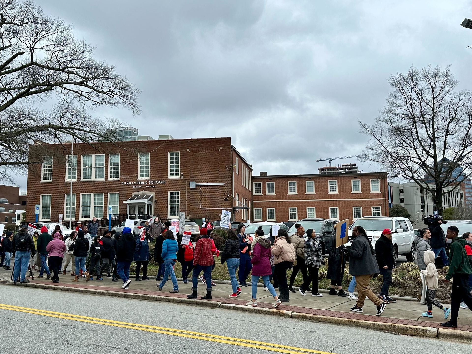 Durham Public Schools employee call out from work to protest wage