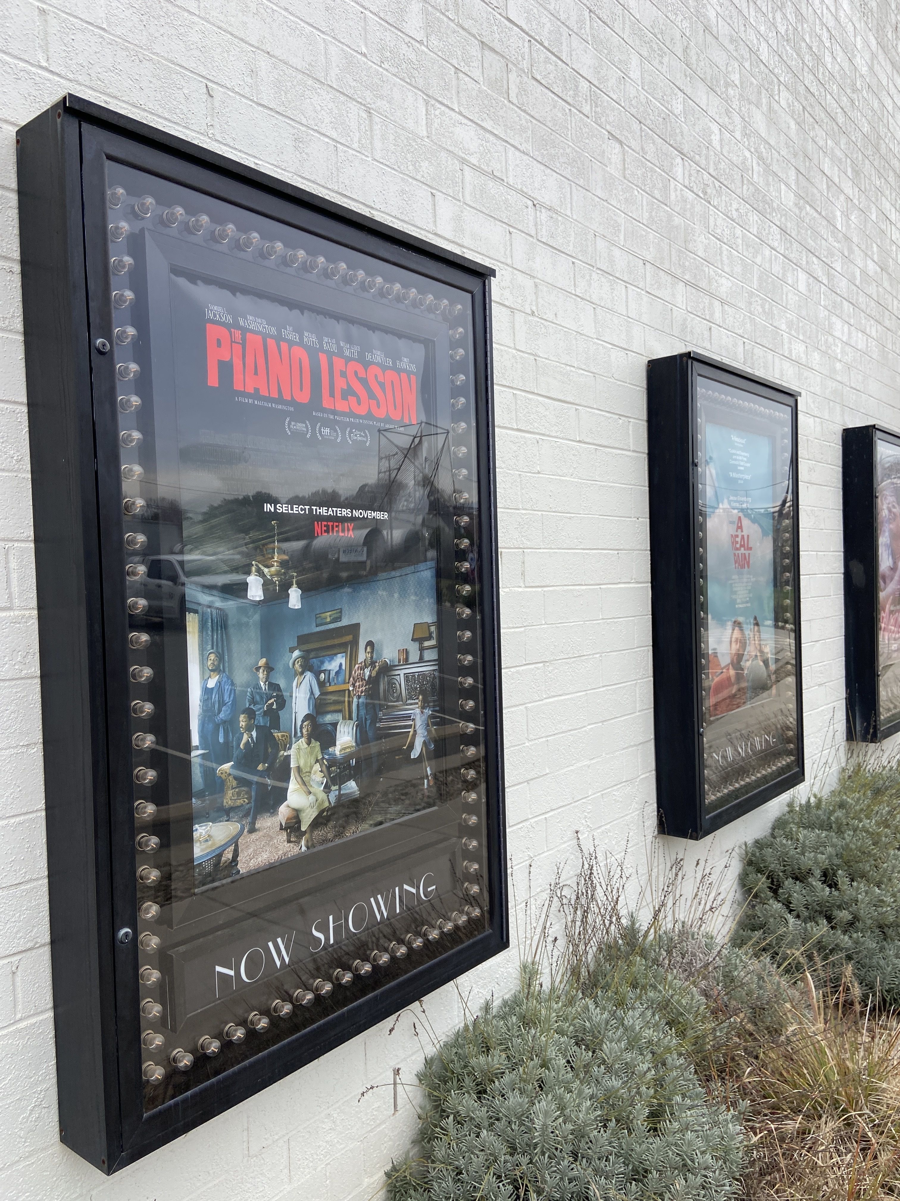 IPH film posters on the outside of the building. 