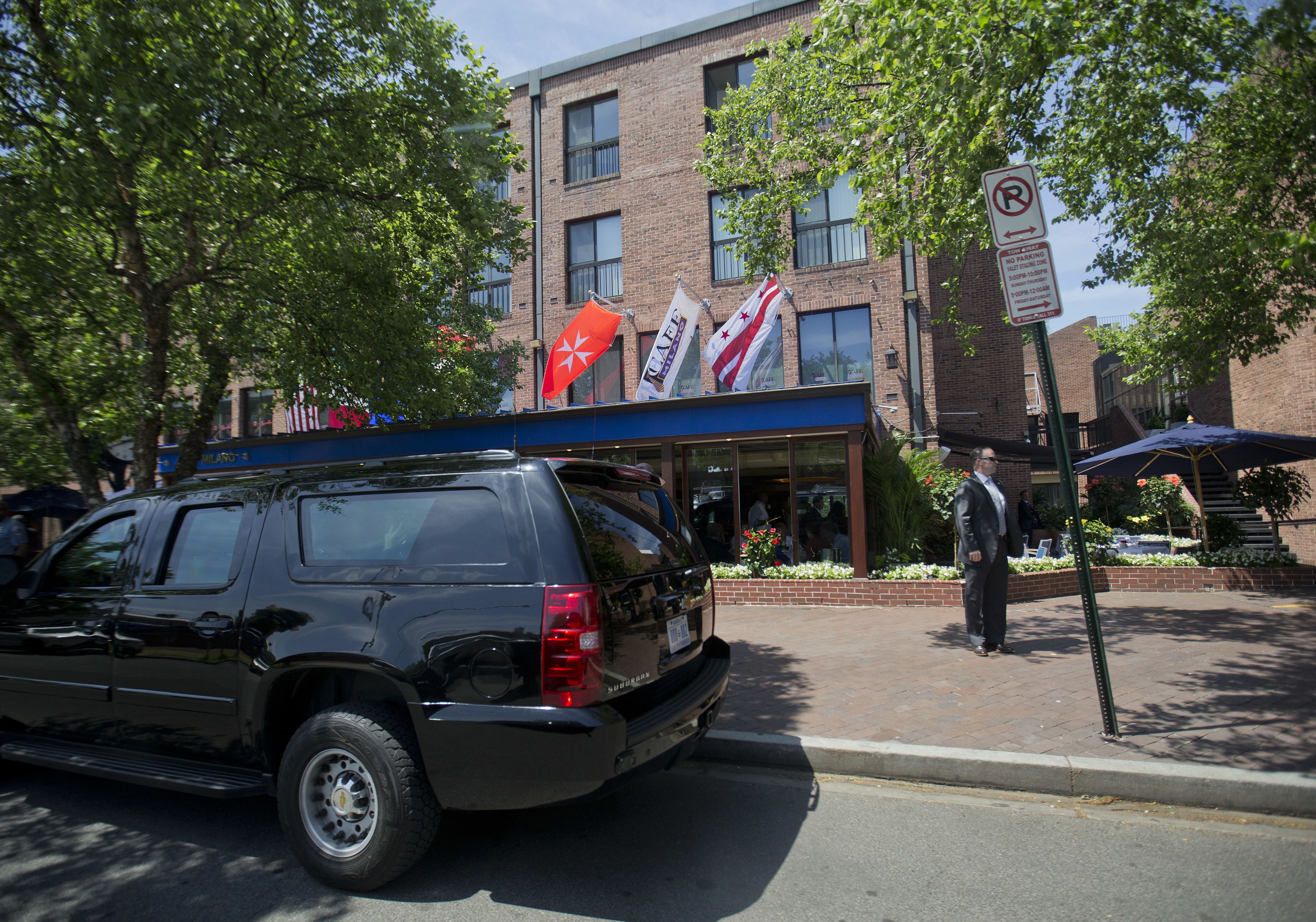 A motorcade vehicle for the Obama family is seen parked outside of Cafe Milano in the Georgetown neighborhood in Washington, Friday, June 10, 2016. The Obama's are having lunch after having attended the graduation of Malia from Sidwell Friends high school today. (AP Photo/Pablo Martinez Monsivais)
