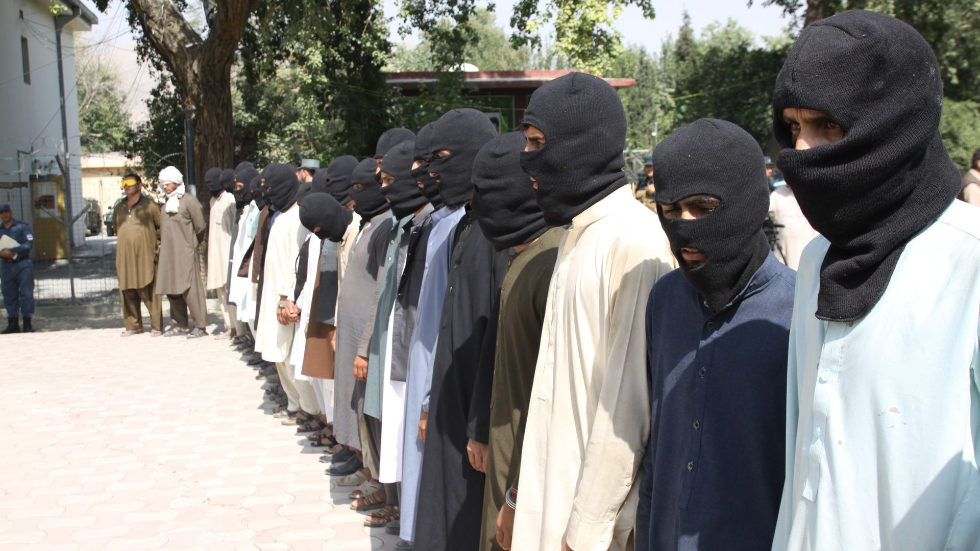 10 members of Daesh and 5 members of Taliban are seen unarmed as they captured by Afghan authorities.