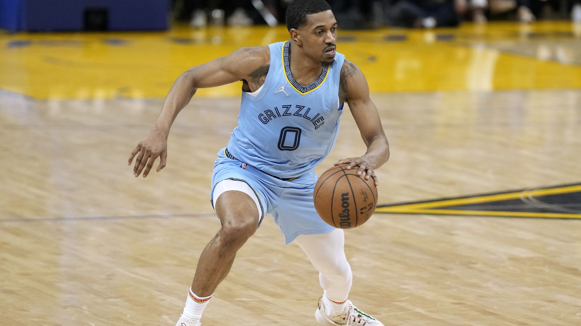 De'Anthony Melton #0 of the Memphis Grizzlies dribbling the ball