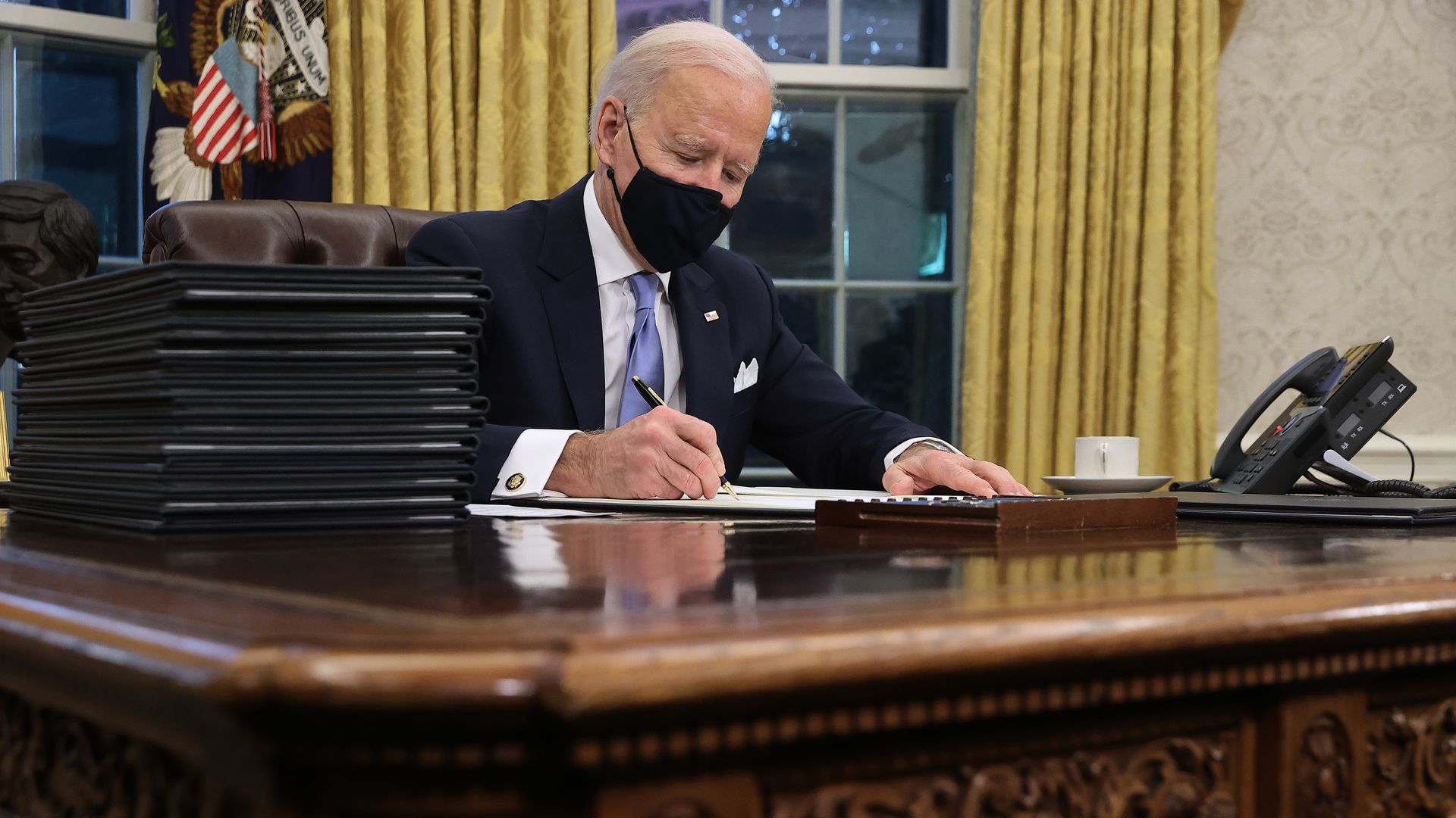 President Biden signs executive orders.