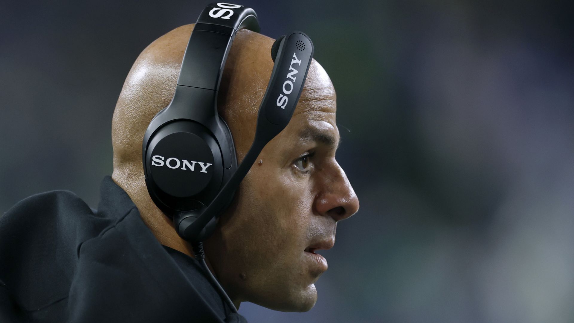Robert Saleh looks on from the sidelines during the fourth quarter of the NFC Divisional Playoffs against the Seattle Seahawks at Lumen Field on January 17, 2026 in Seattle, Washington.
