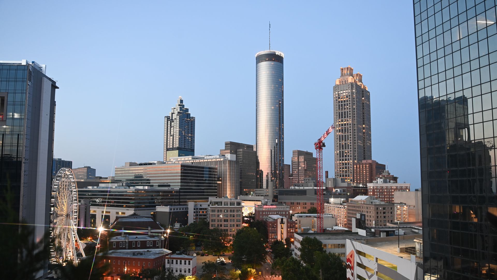 A photo of the Atlanta skyline with the cylindrical Westin Peachtree Plaza freatured prominently.