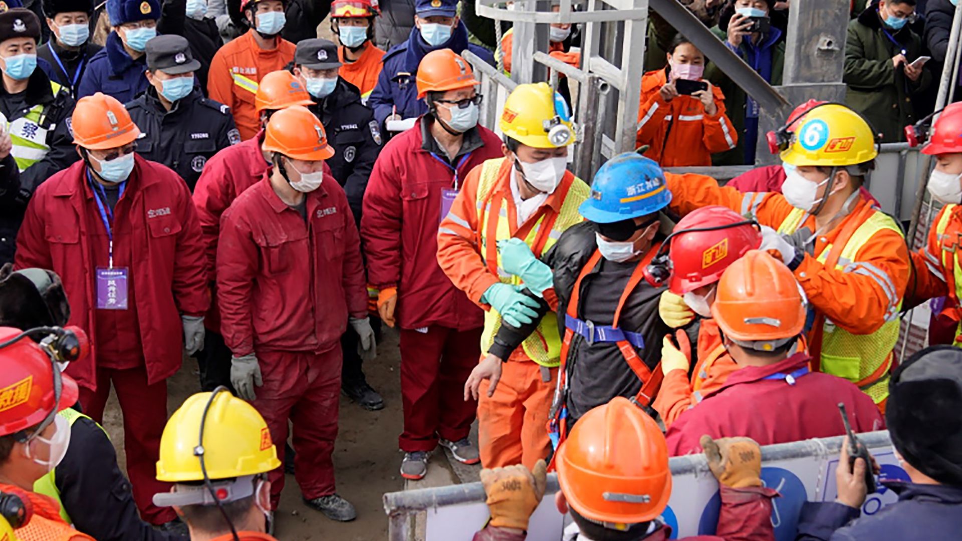 A Chinese miner is saved from hundreds of metres underground where he had been trapped for two weeks after a gold mine explosion in Qixia, in eastern China's Shandong province