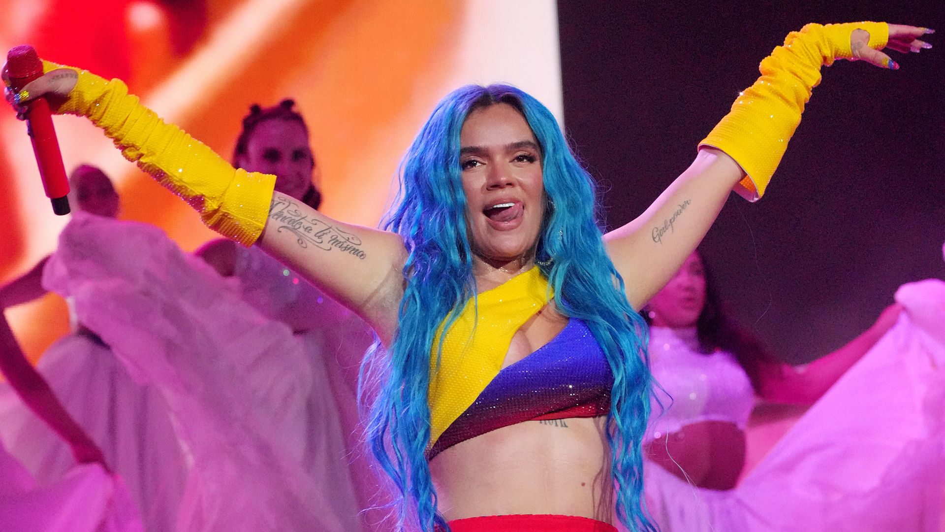 Popstar Karol G in a bright costume