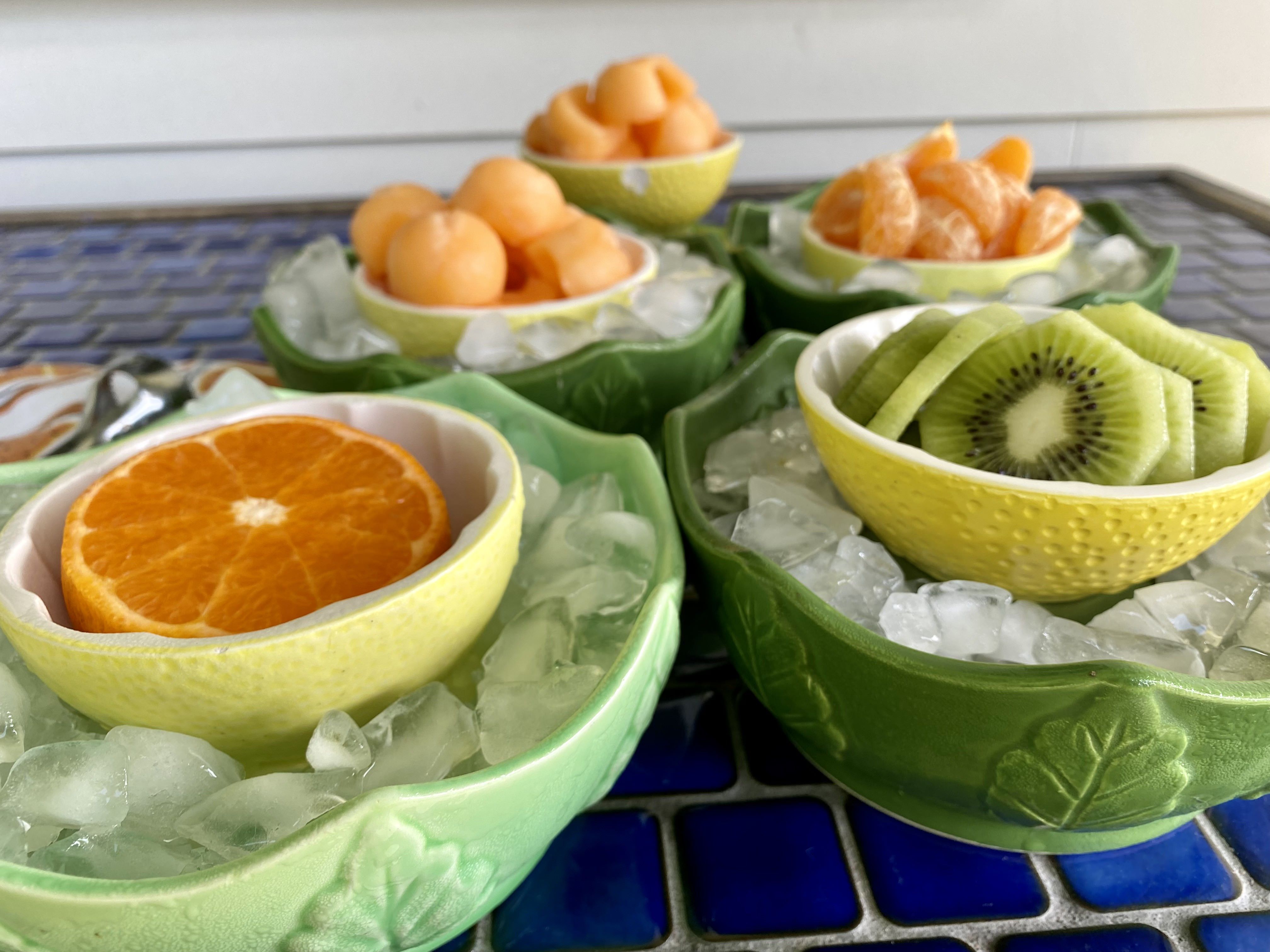 Citrus Bowls filled with various fruits.