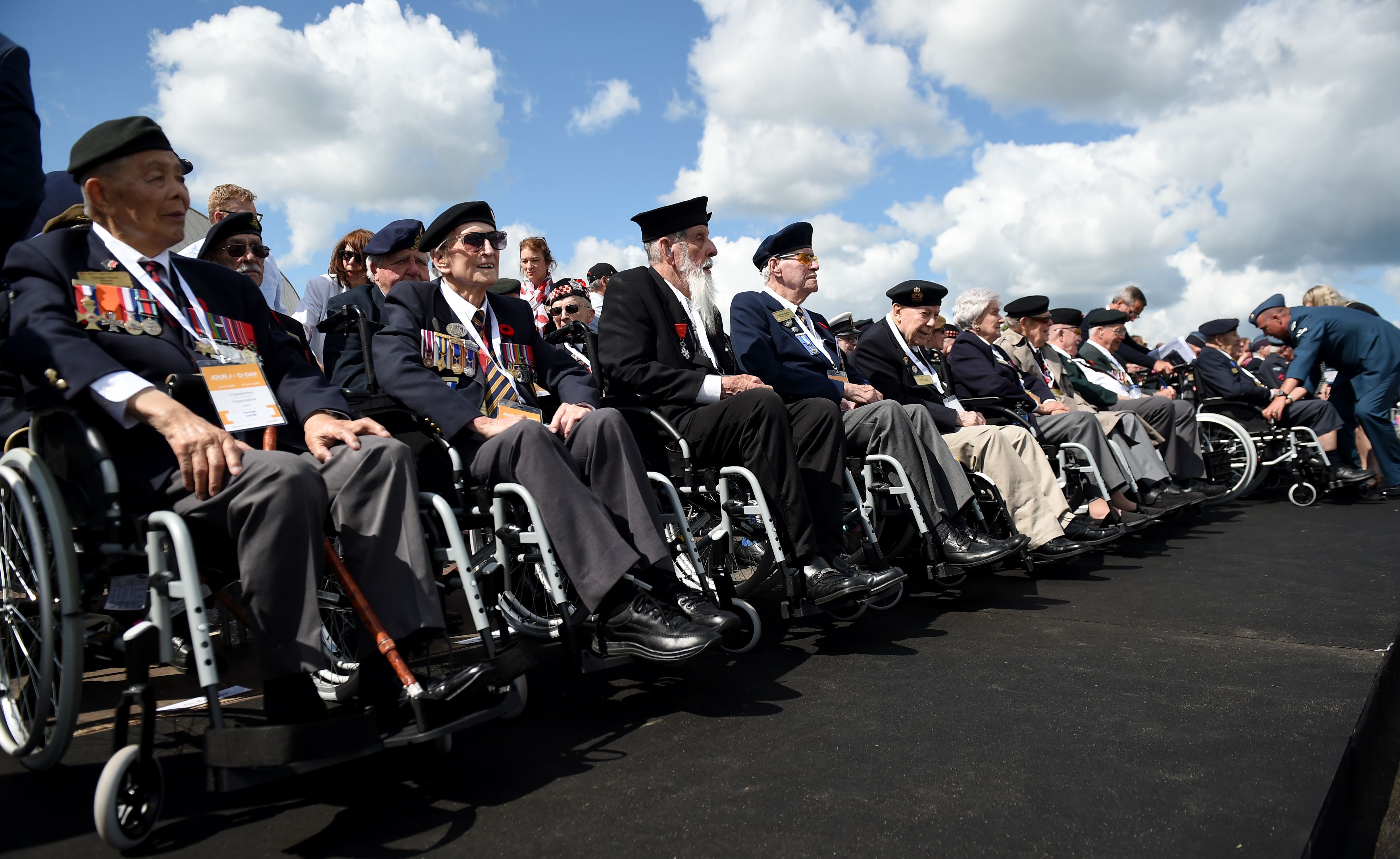 Canadian veterans attend prior the international ceremony on Juno Beach in Courseulles-sur-Mer, Normandy, northwestern France.