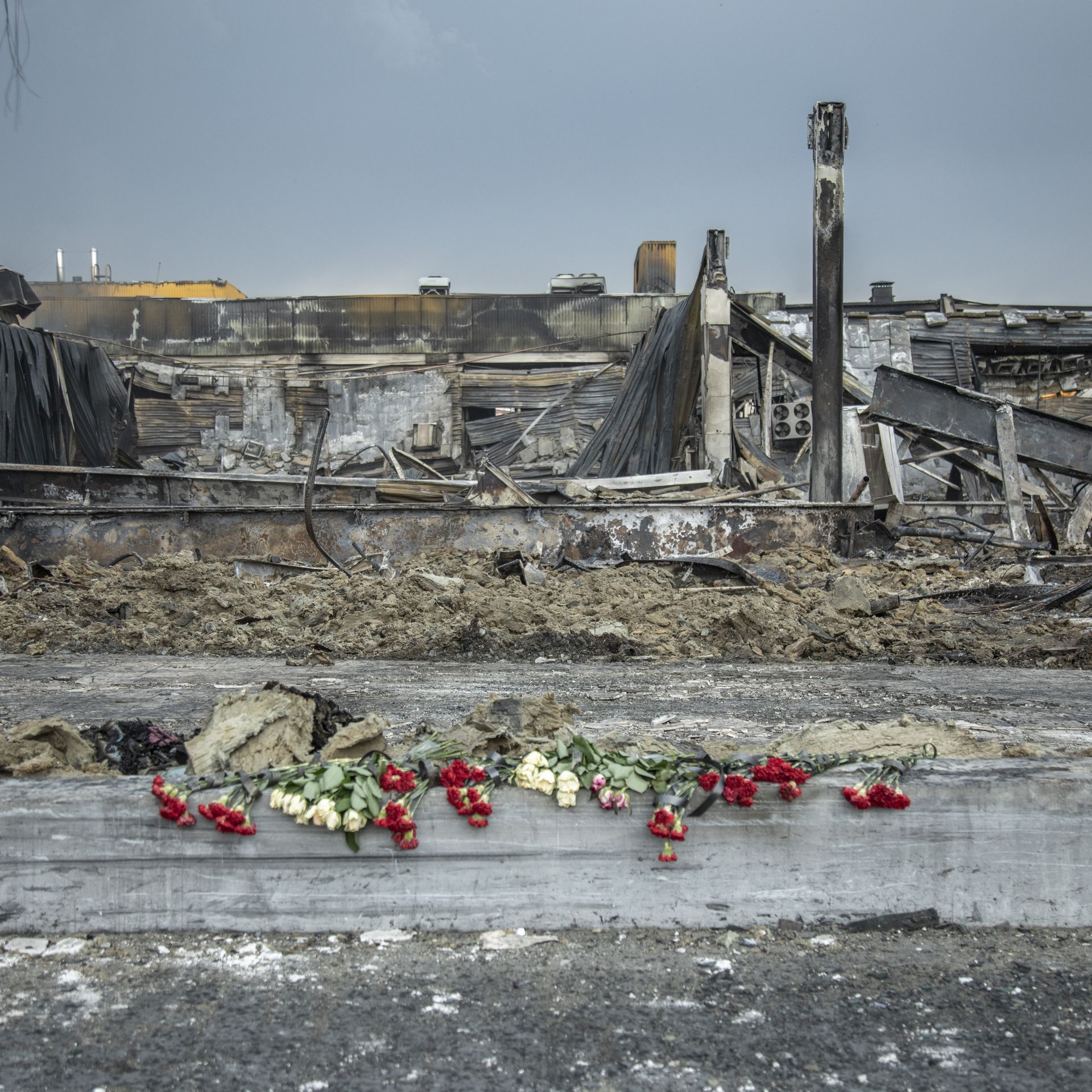 Memorial at the site of a Russian strike on a Ukrainian mall