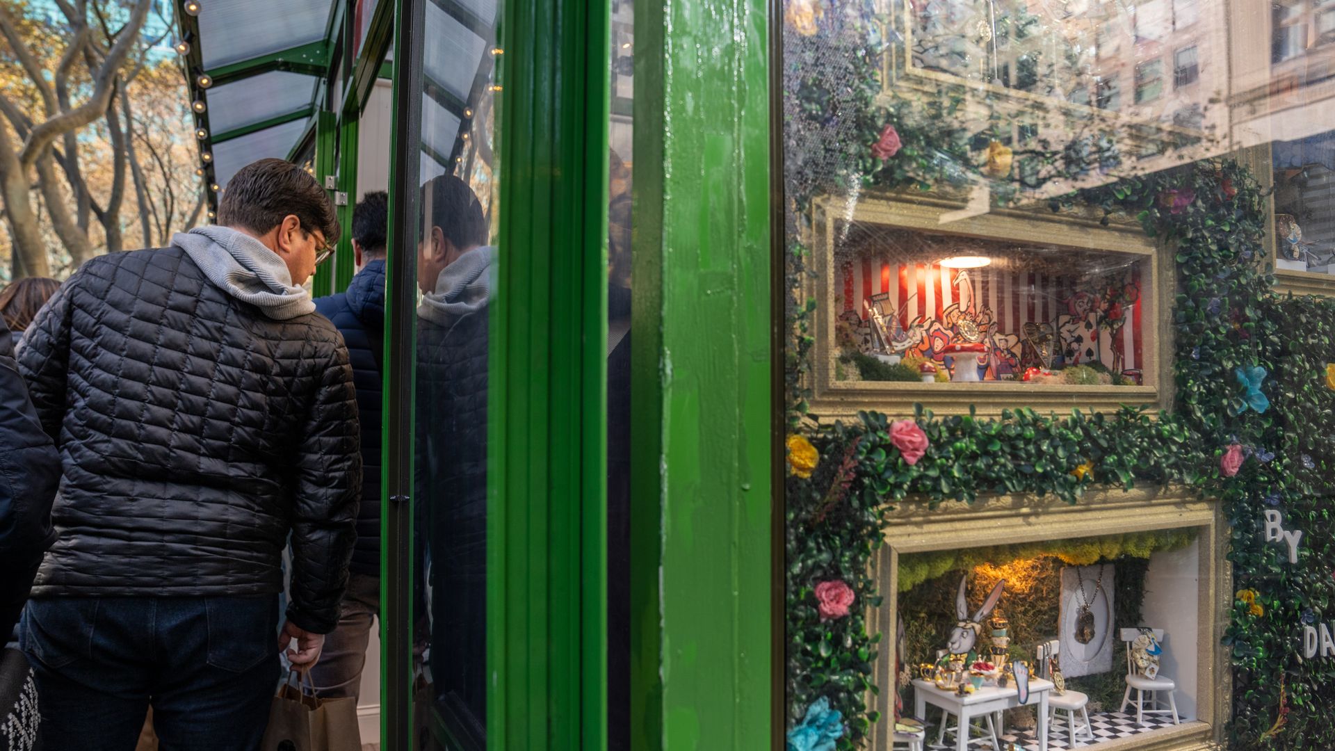 Shopper looking into xmas window