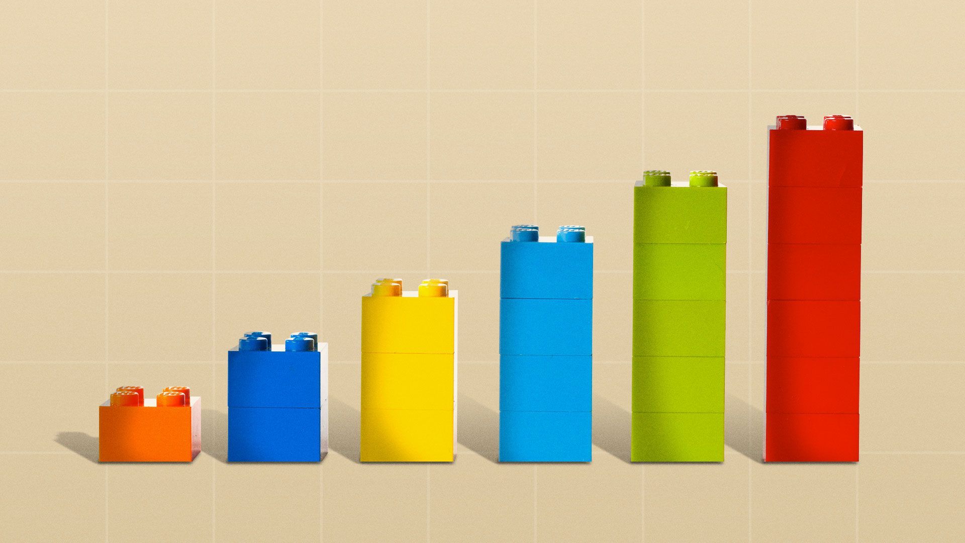 Illustration of an upward trending bar graph made of legos