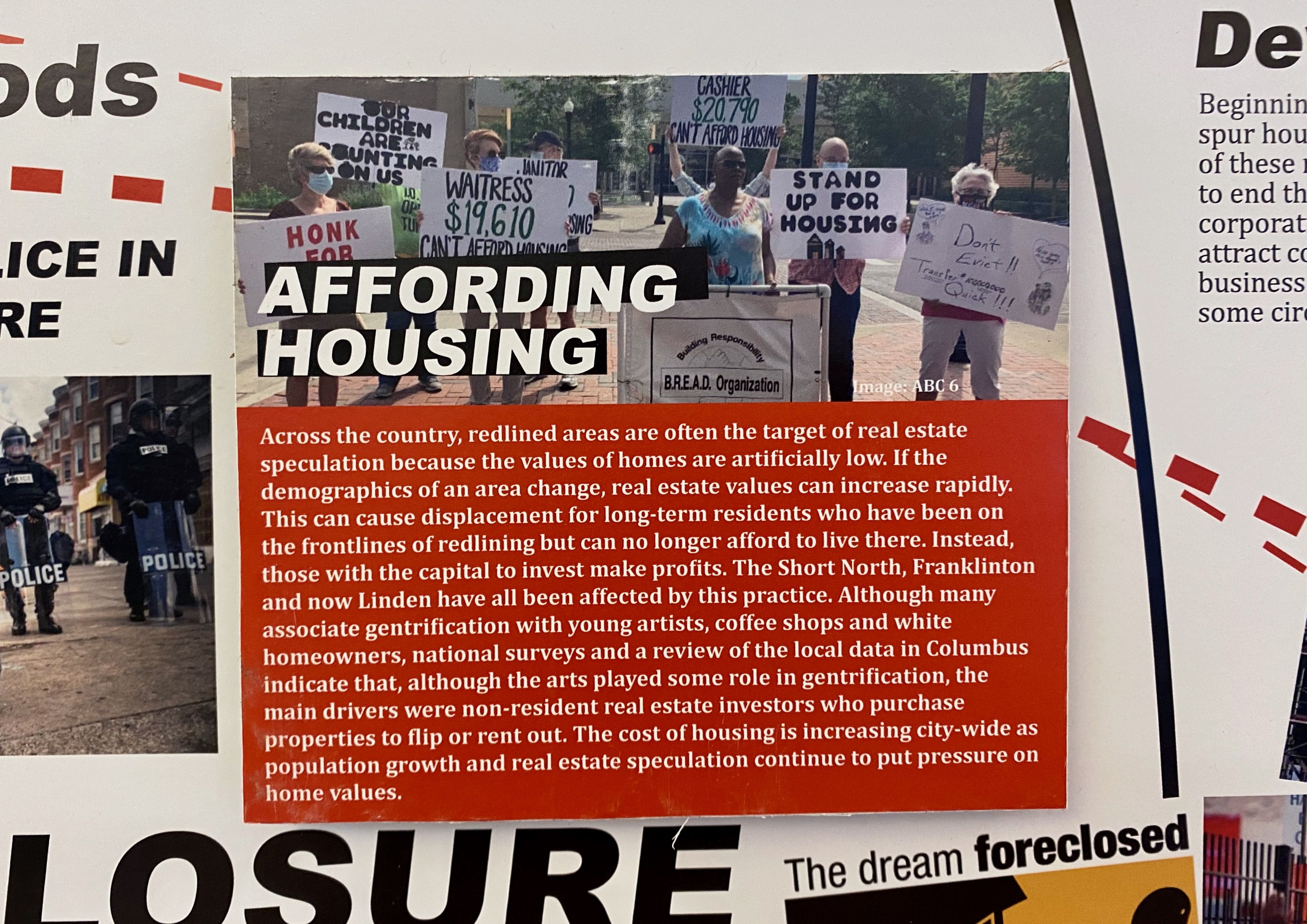 A story card on the exhibit explains redlining's association with gentrification today