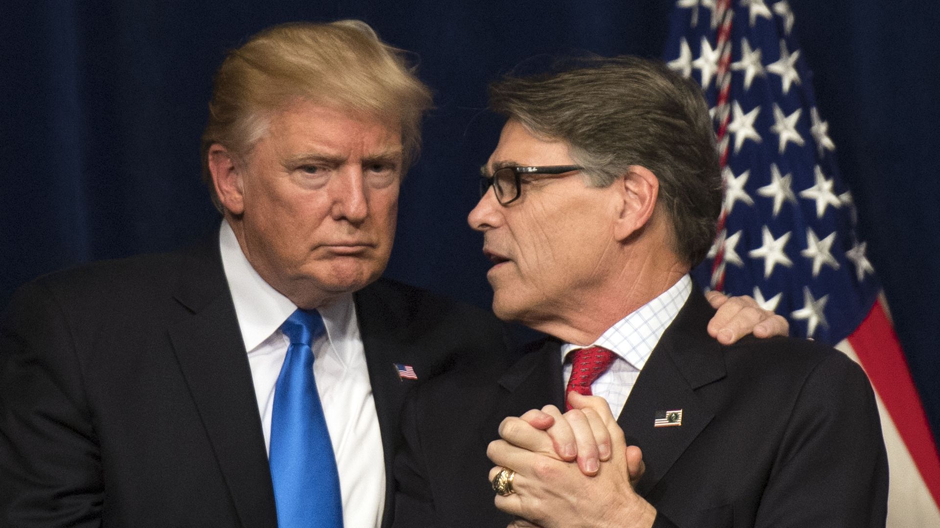  U.S. President Donald Trump stands next to Energy Secretary Rick Perry