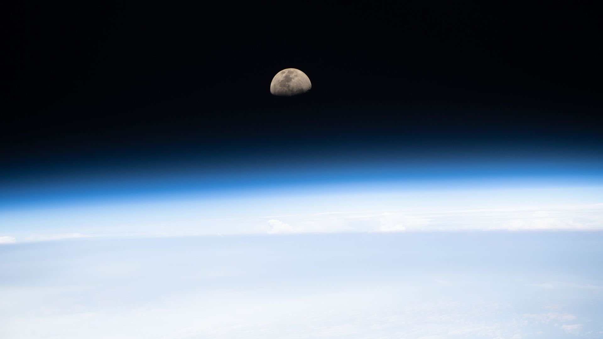 The Moon seen above the Earth from the International Space Station